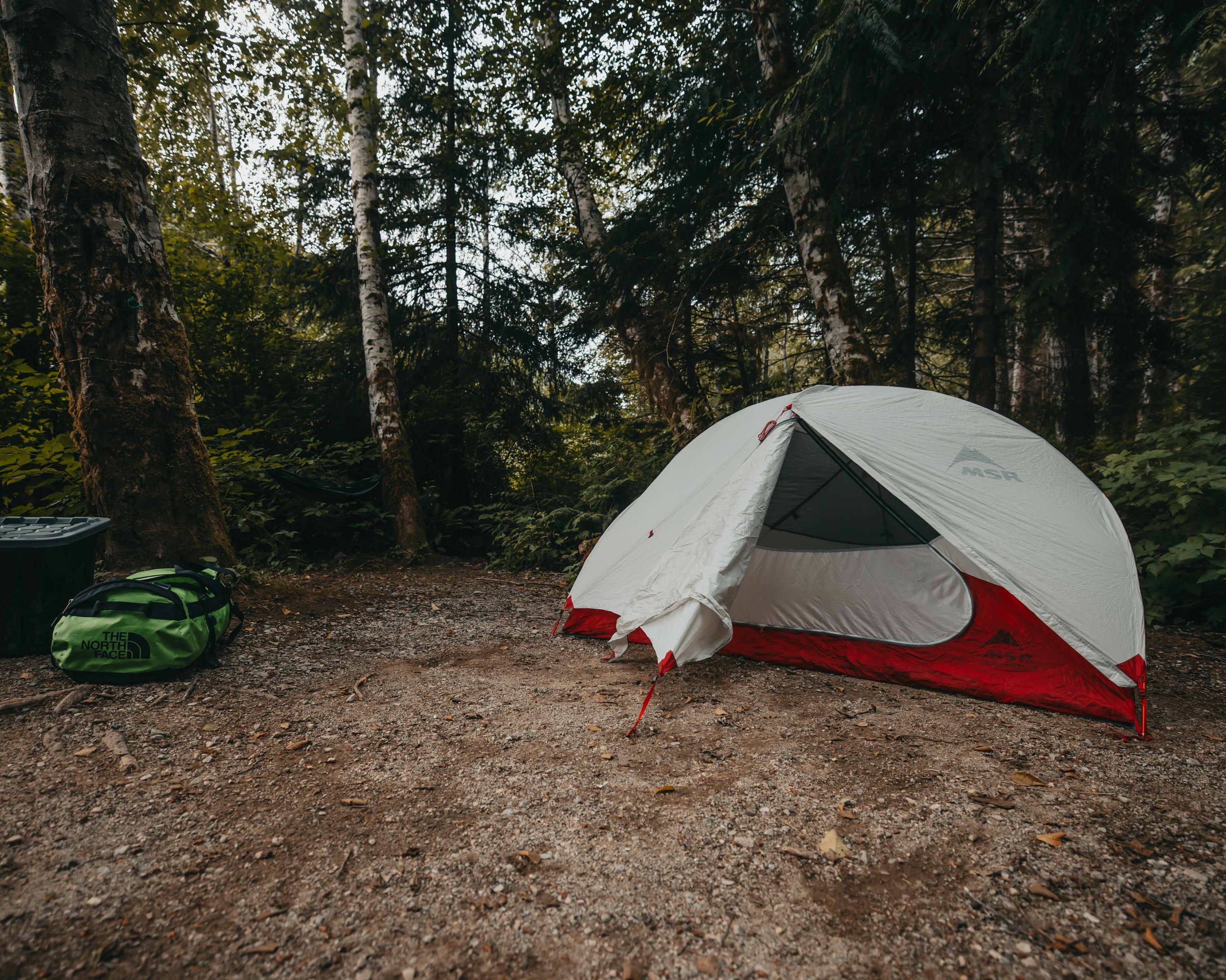 an MSR hubba hubba LT 2 tent sent up in a campsite near a remote lake on vancouver island british columbia