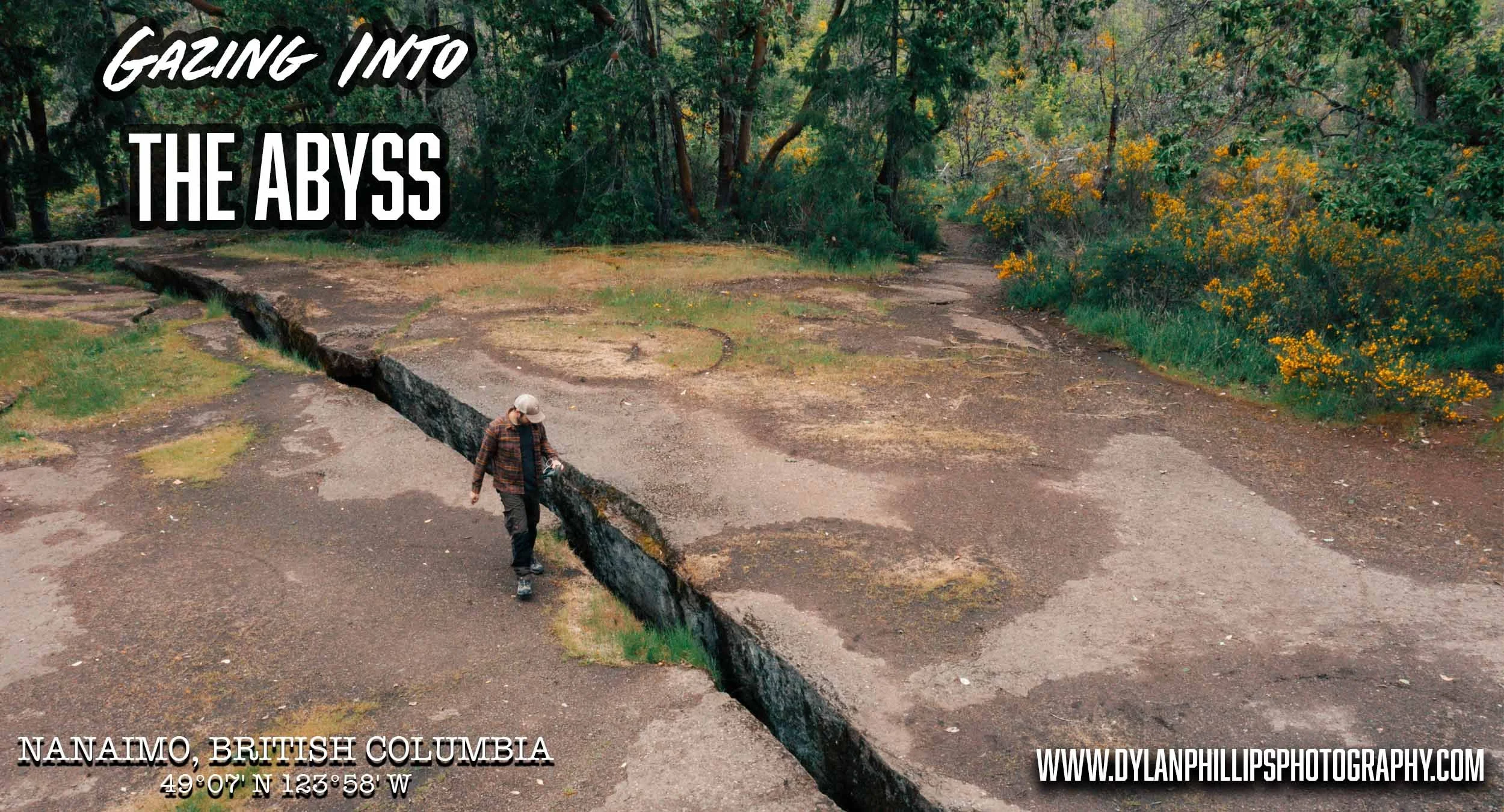 A dramatic view of The Abyss in Nanaimo, BC, showing the deep crack in the forested ground along a popular hiking trail on Vancouver Island.