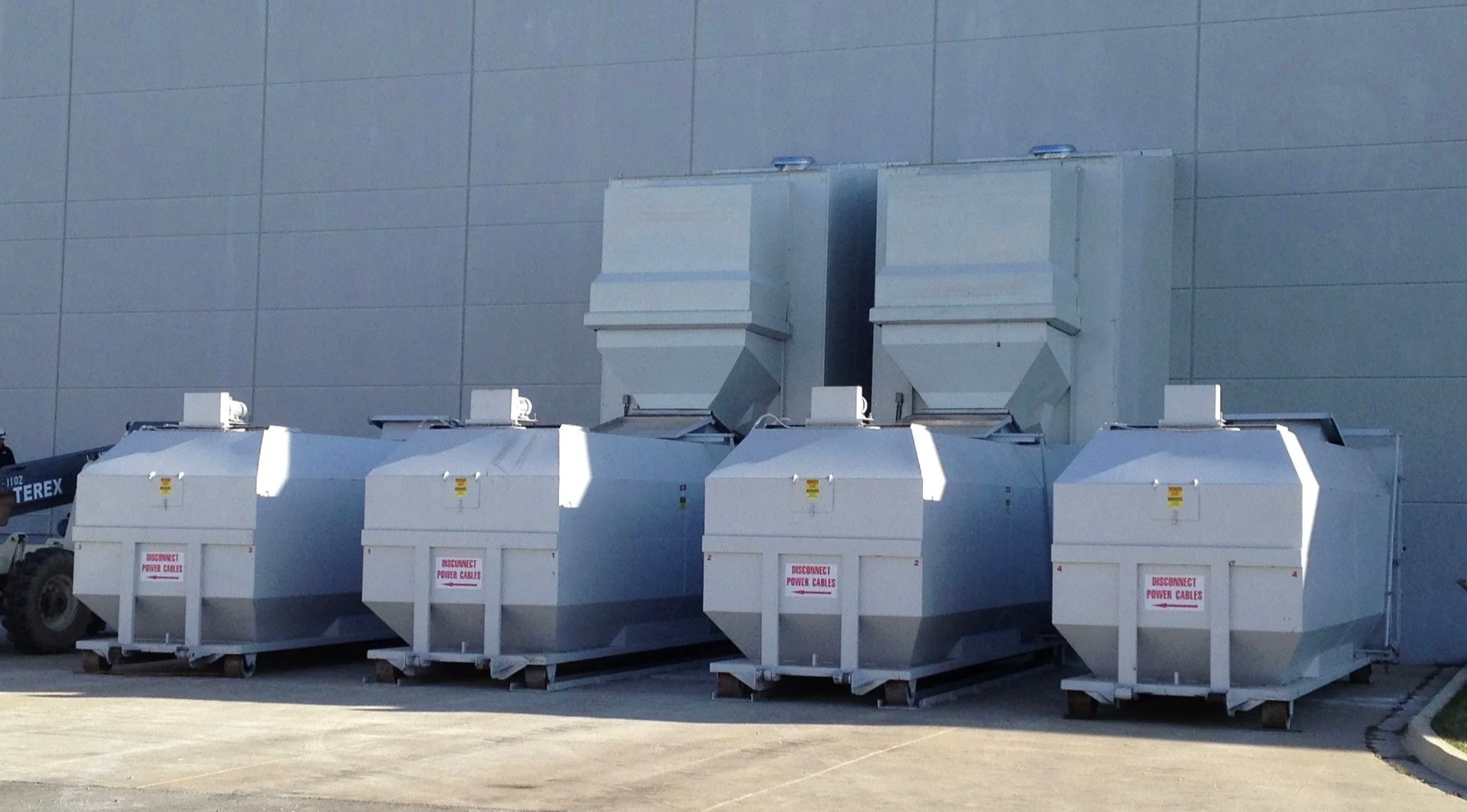 Dual fully enclosed dump system custom built by P&D Recycle