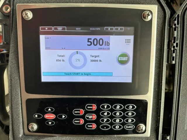 Digital weight scale display showing 500 pounds, with a target weight of 30,000 pounds and a total weight of 856 pounds.