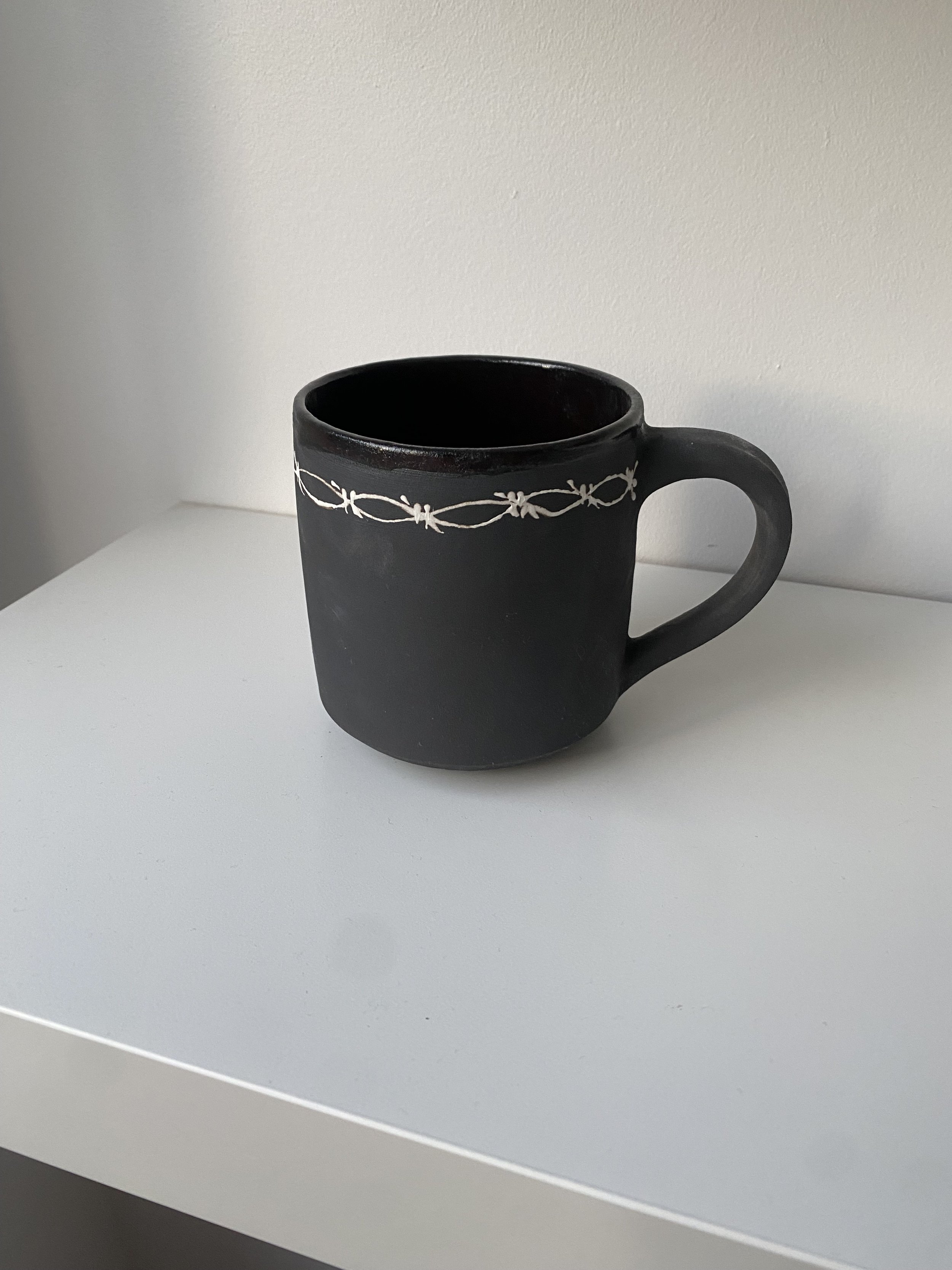 Black Barb Mug