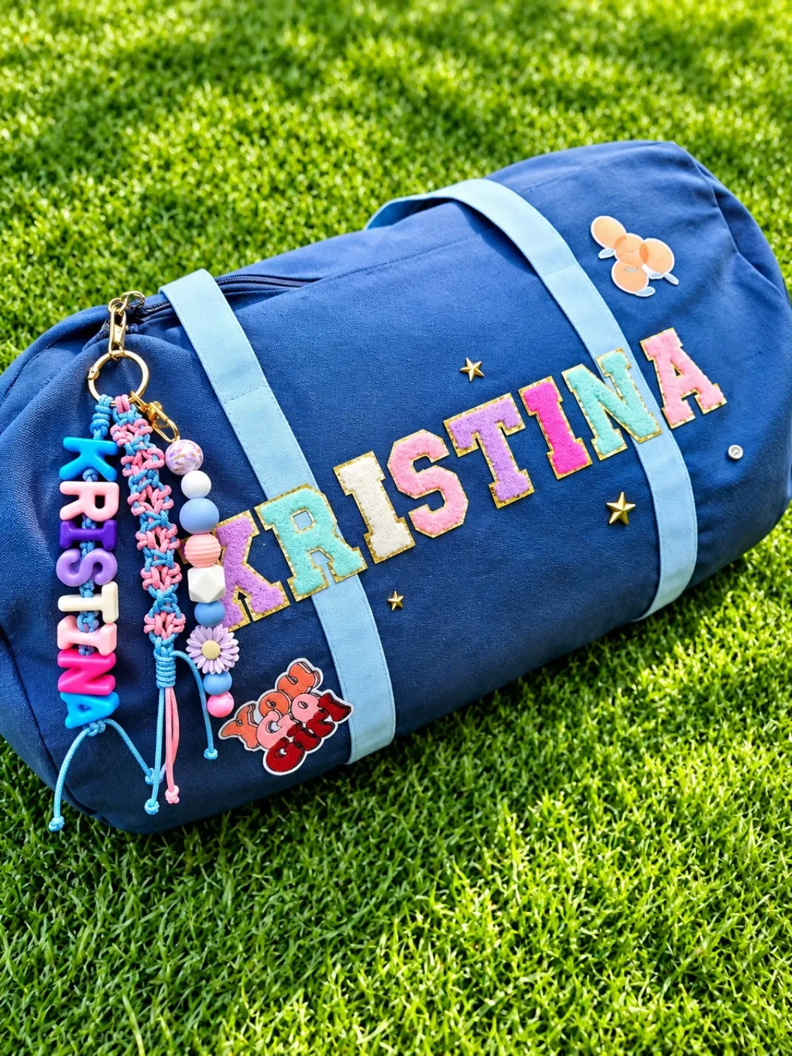 Personalised blue backpack with colourful name design and custom details
