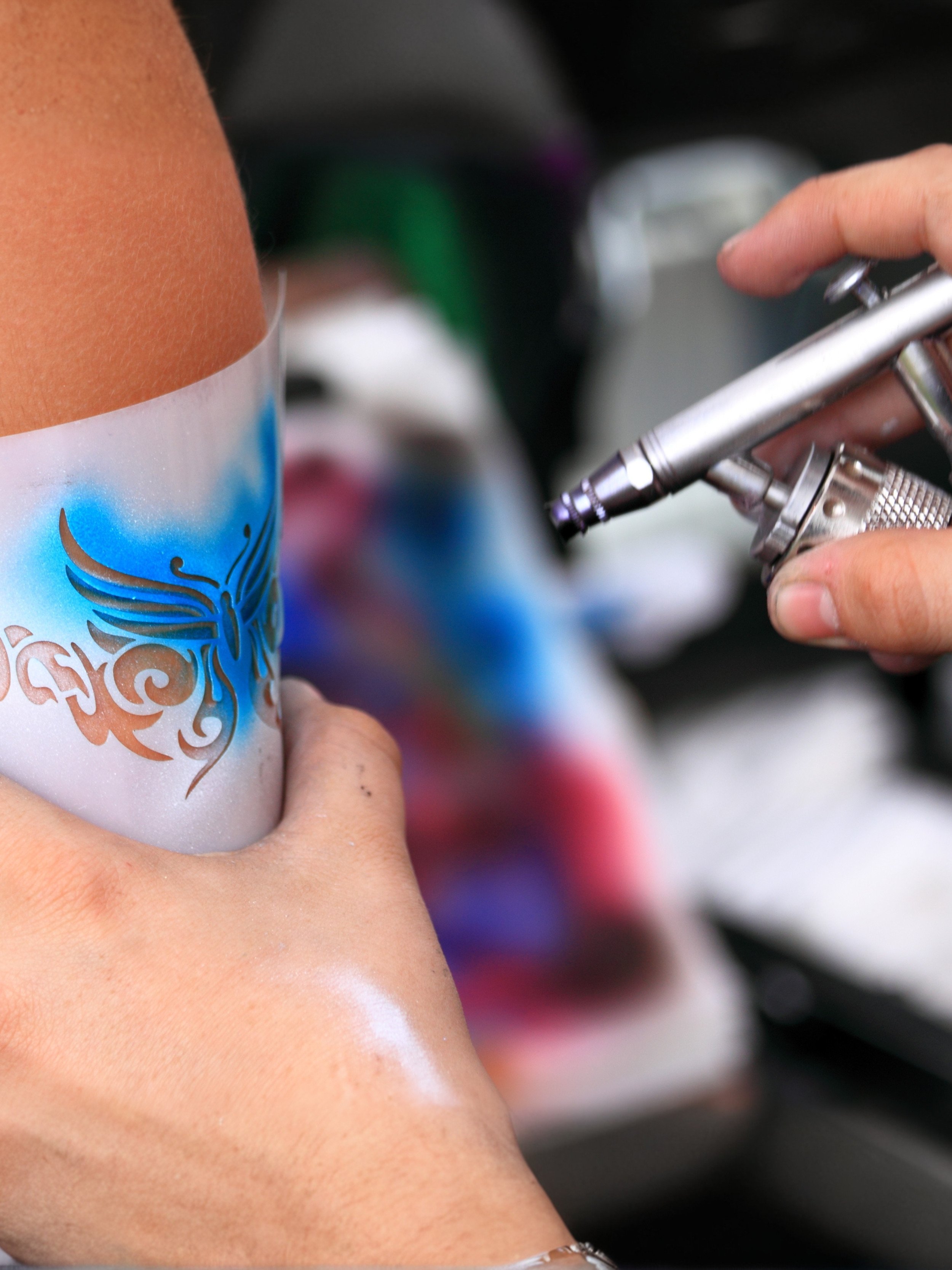 Airbrush temporary tattoo being applied at an event in Dublin