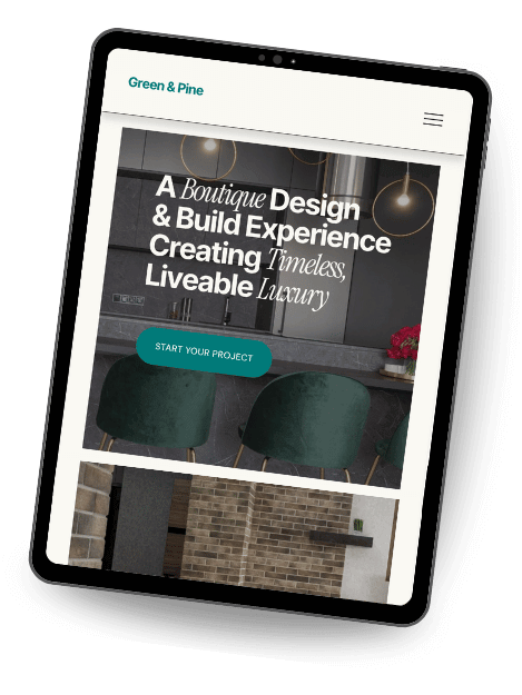A tablet displaying a custom builder/architecture website template. The hero image features a high-end kitchen interior with bold white text: "A Boutique Design & Build Experience Creating Timeless, Liveable Luxury" and a teal call-to-action button.