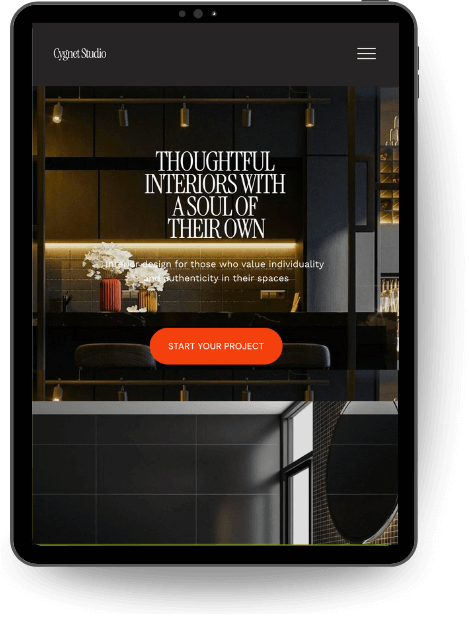 A tablet displaying the homepage of a dark, elegant interior design website template. The screen shows the hero section with the headline "THOUGHTFUL INTERIORS WITH A SOUL OF THEIR OWN" next to a moody kitchen image.