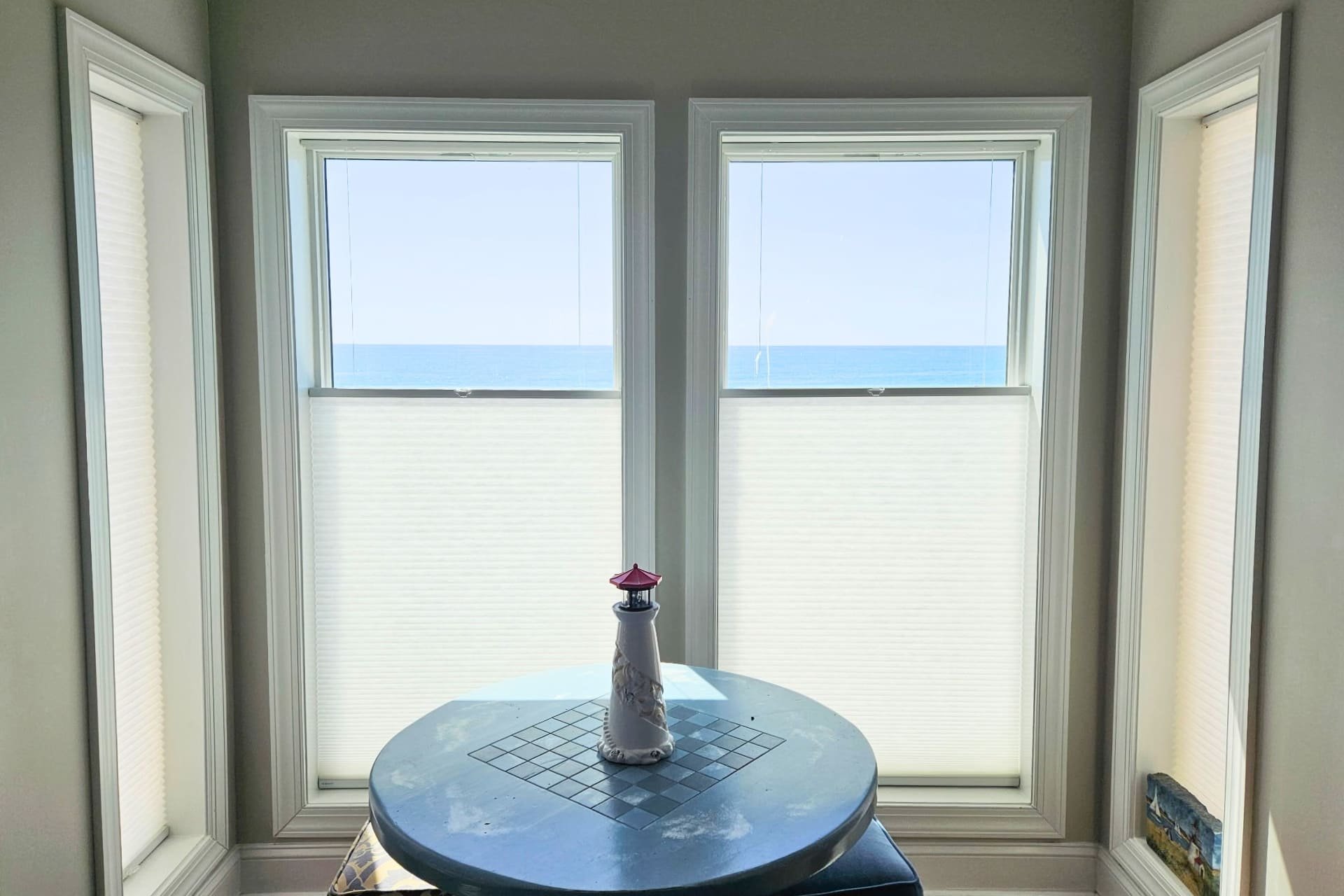 vacation home windows with top up bottom down shades