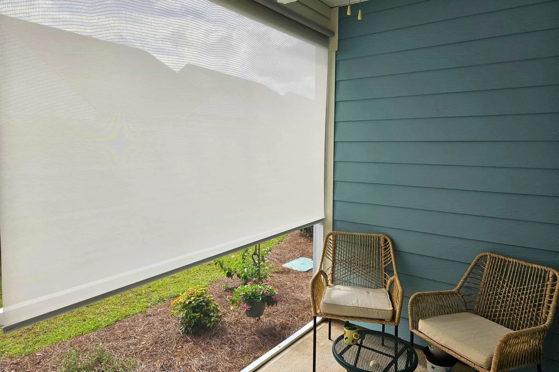 Solar roller shades on an outdoor patio