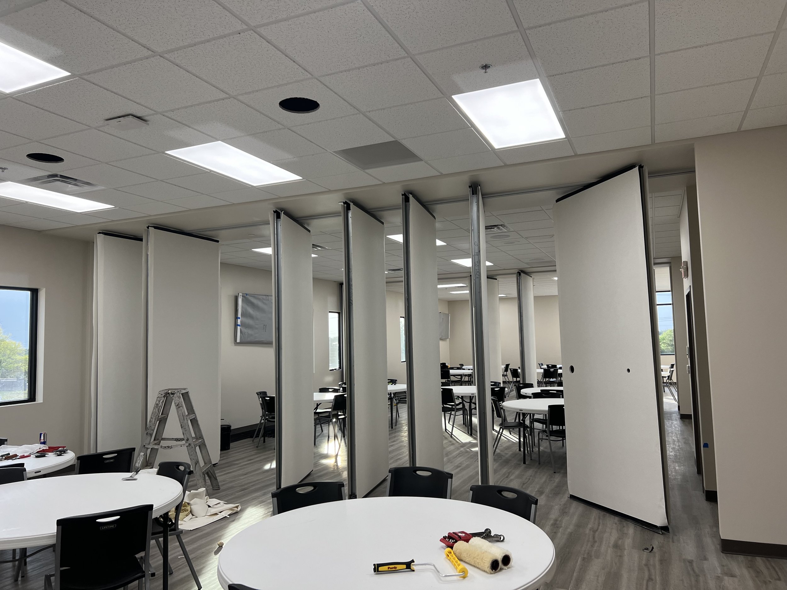 Movable wall resurfacing service on site