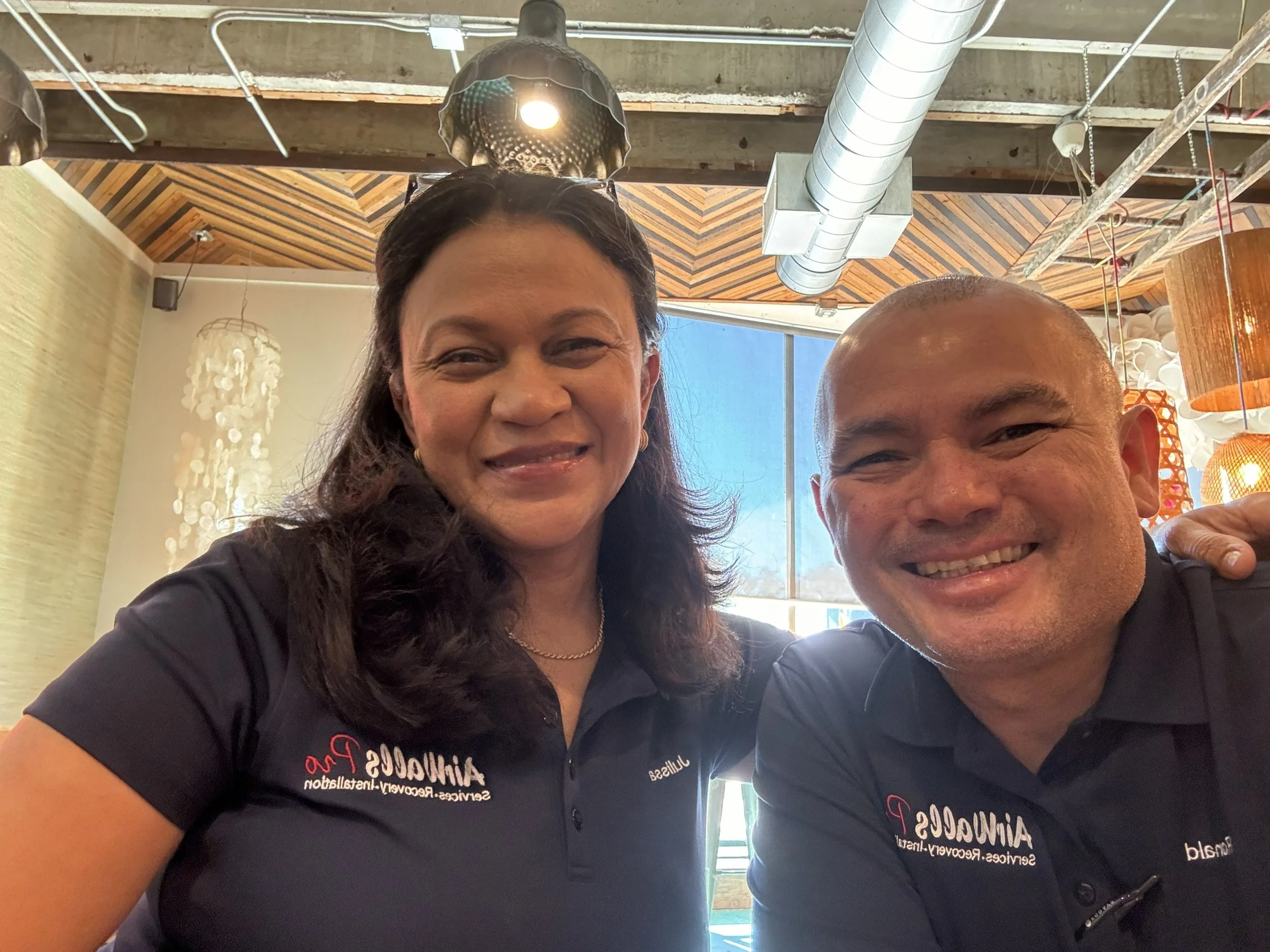 Technician repairing operable partition system