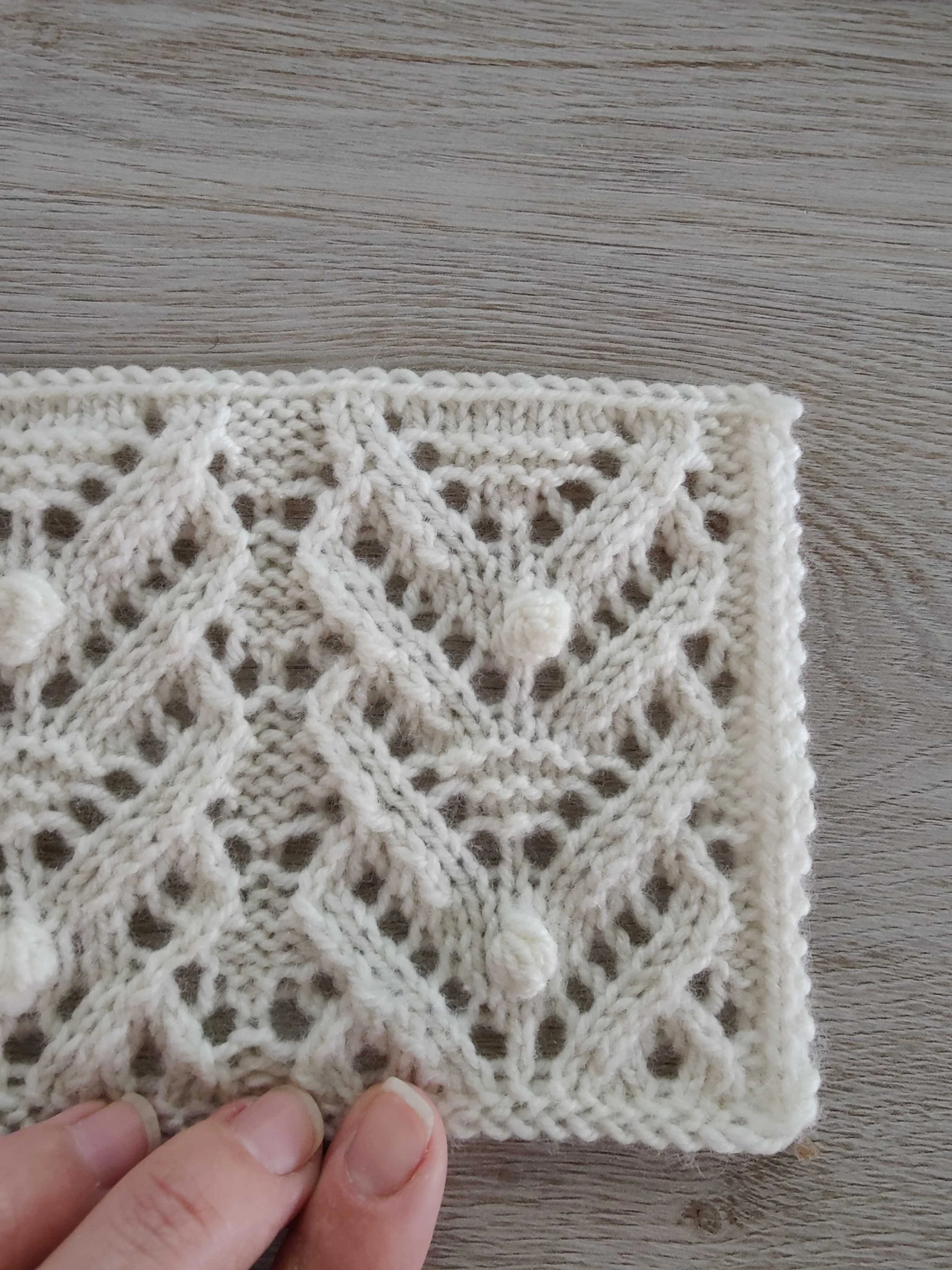 Kirsten Joel knitting a sample for a magazine publication.