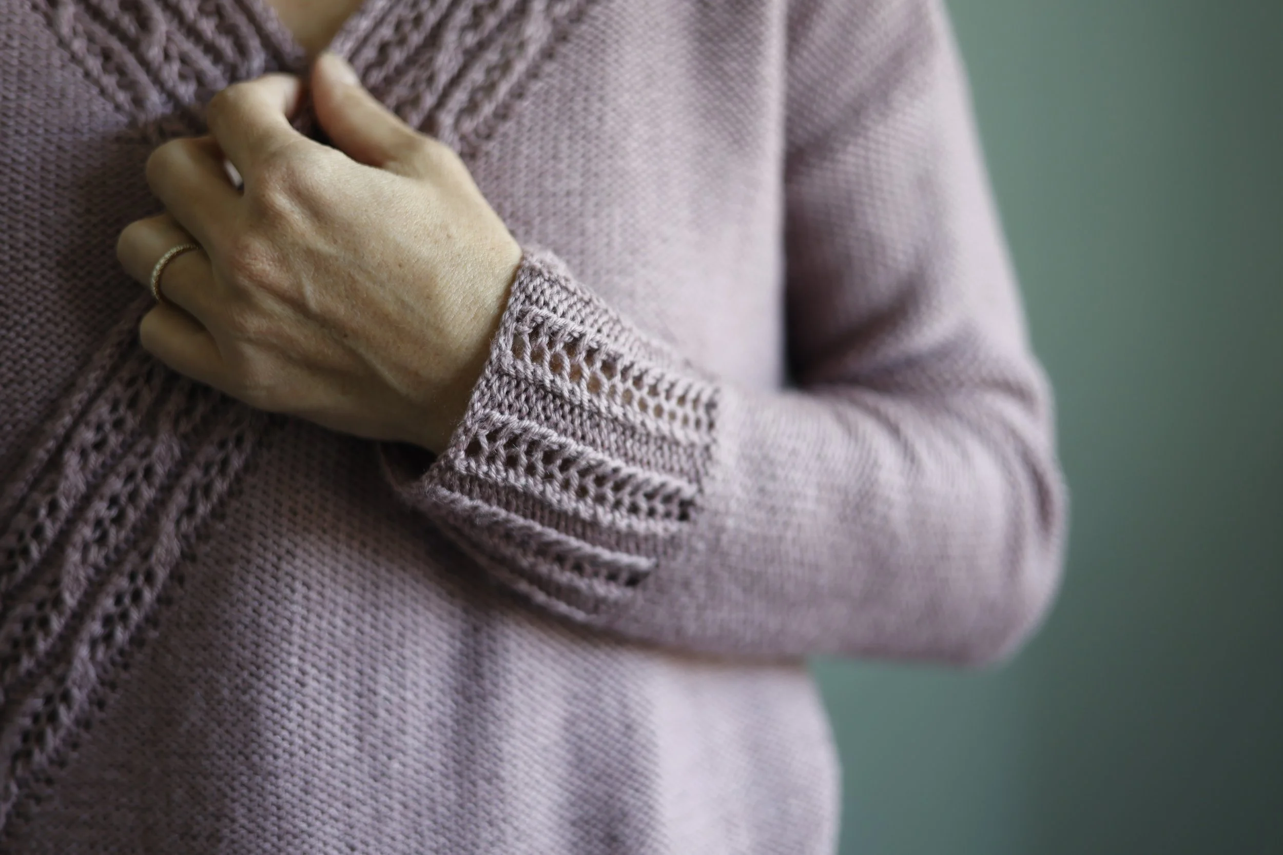 Detail of hand-knit lace pattern from a published design.