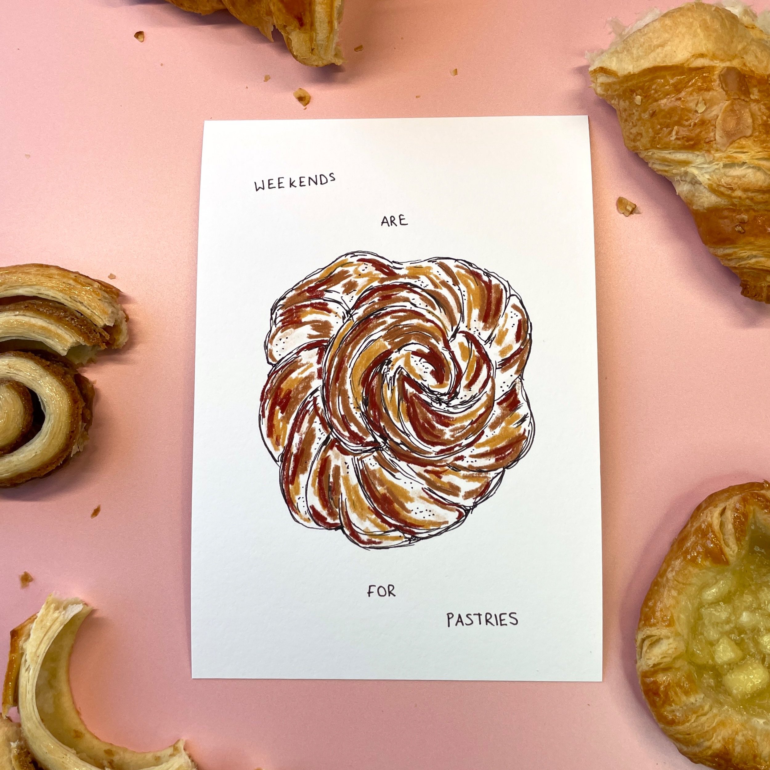 An illustration of a cinnamon bun on a pink background with pastries around it