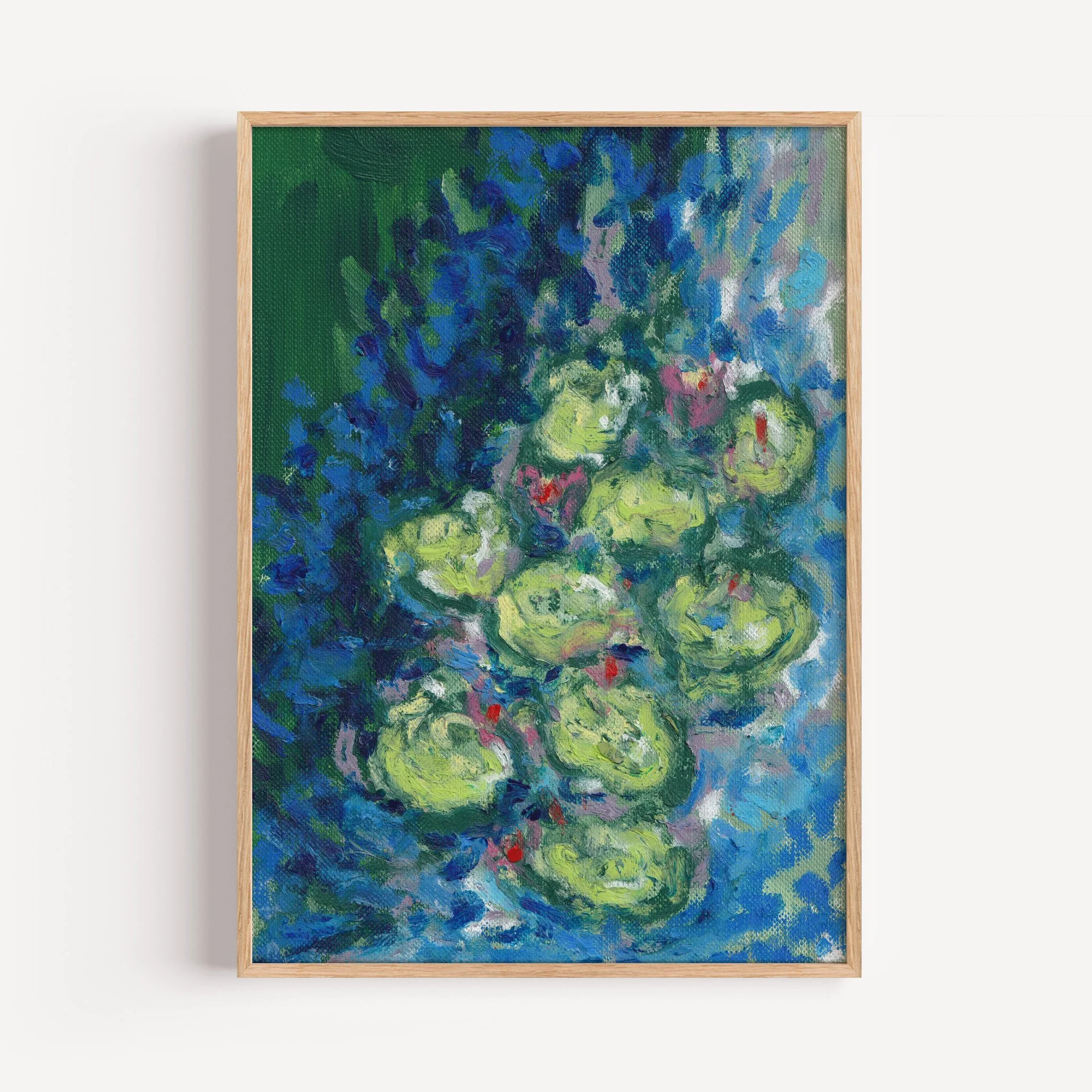 Colorful impressionist painting of green water lilies on a pond, with blue and purple foliage around them, framed in light wood.