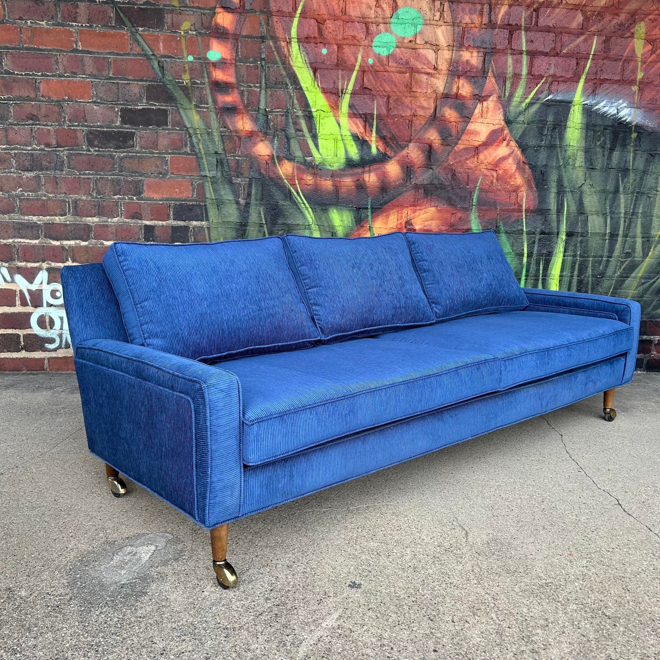 mid-century-modern-sofa-reupholstered-blue-corduroy-on-casters-possibly-selig-5664.jpeg