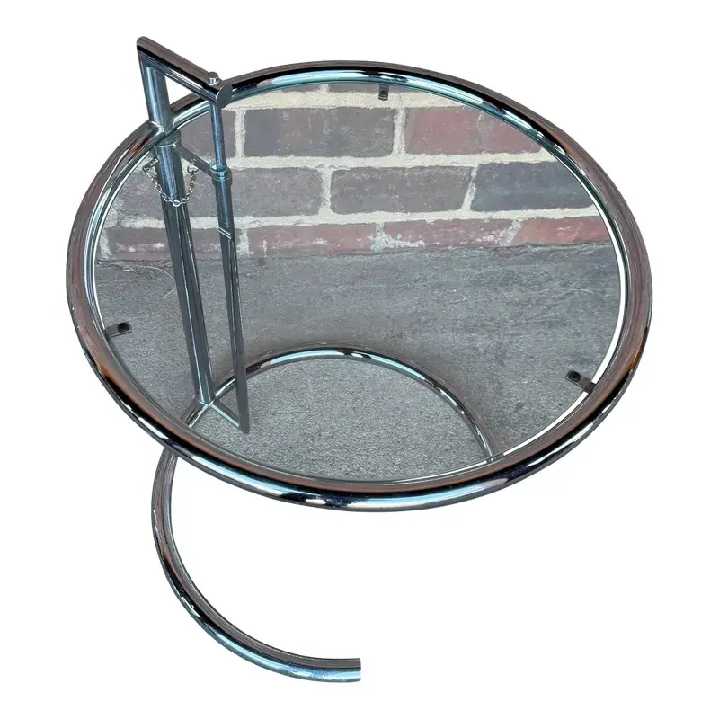 pair-of-adjustable-chrome-and-glass-tables-eileen-gray-style-2261.webp