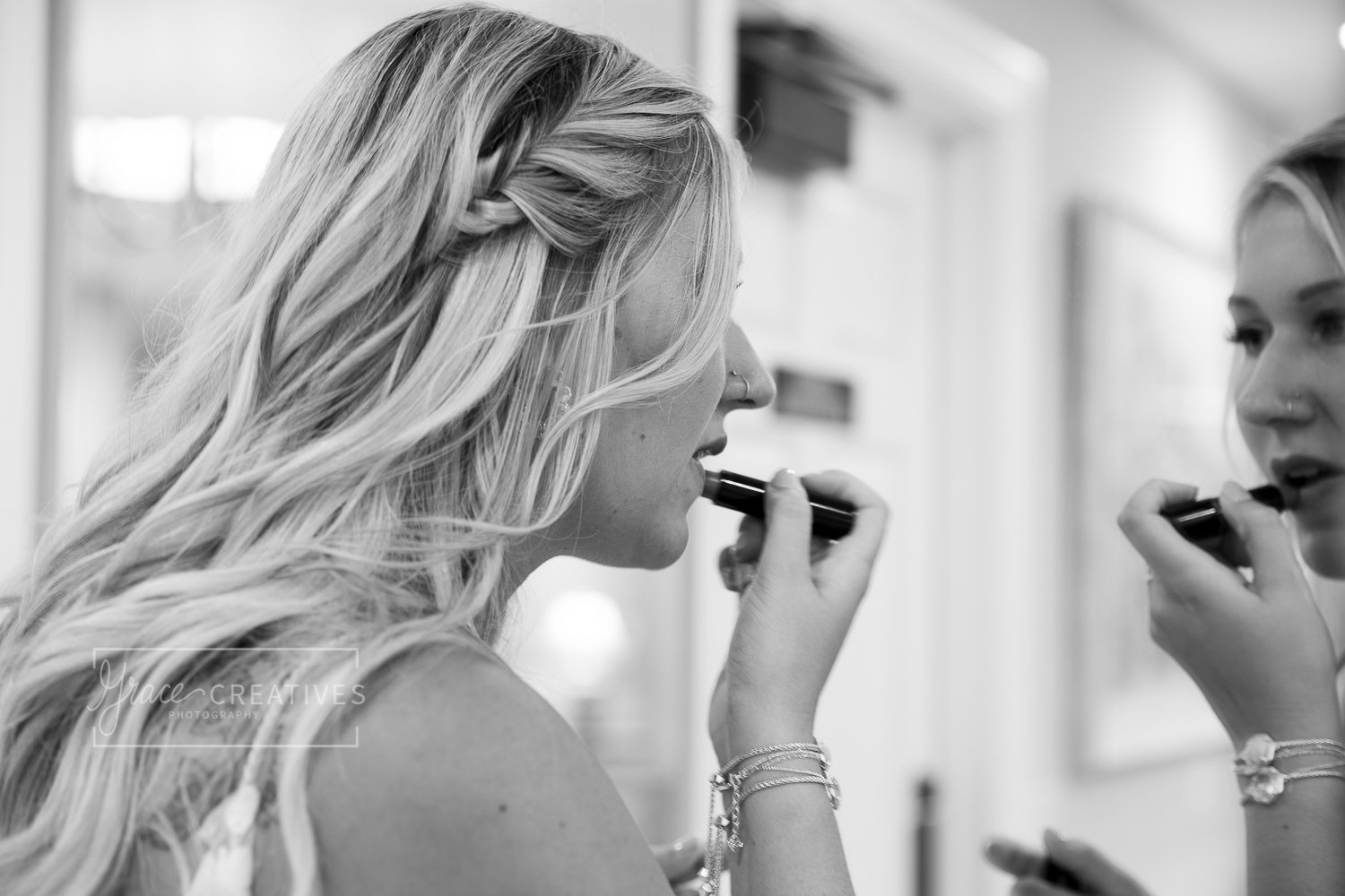 Wisconsin Bride applying lipstick