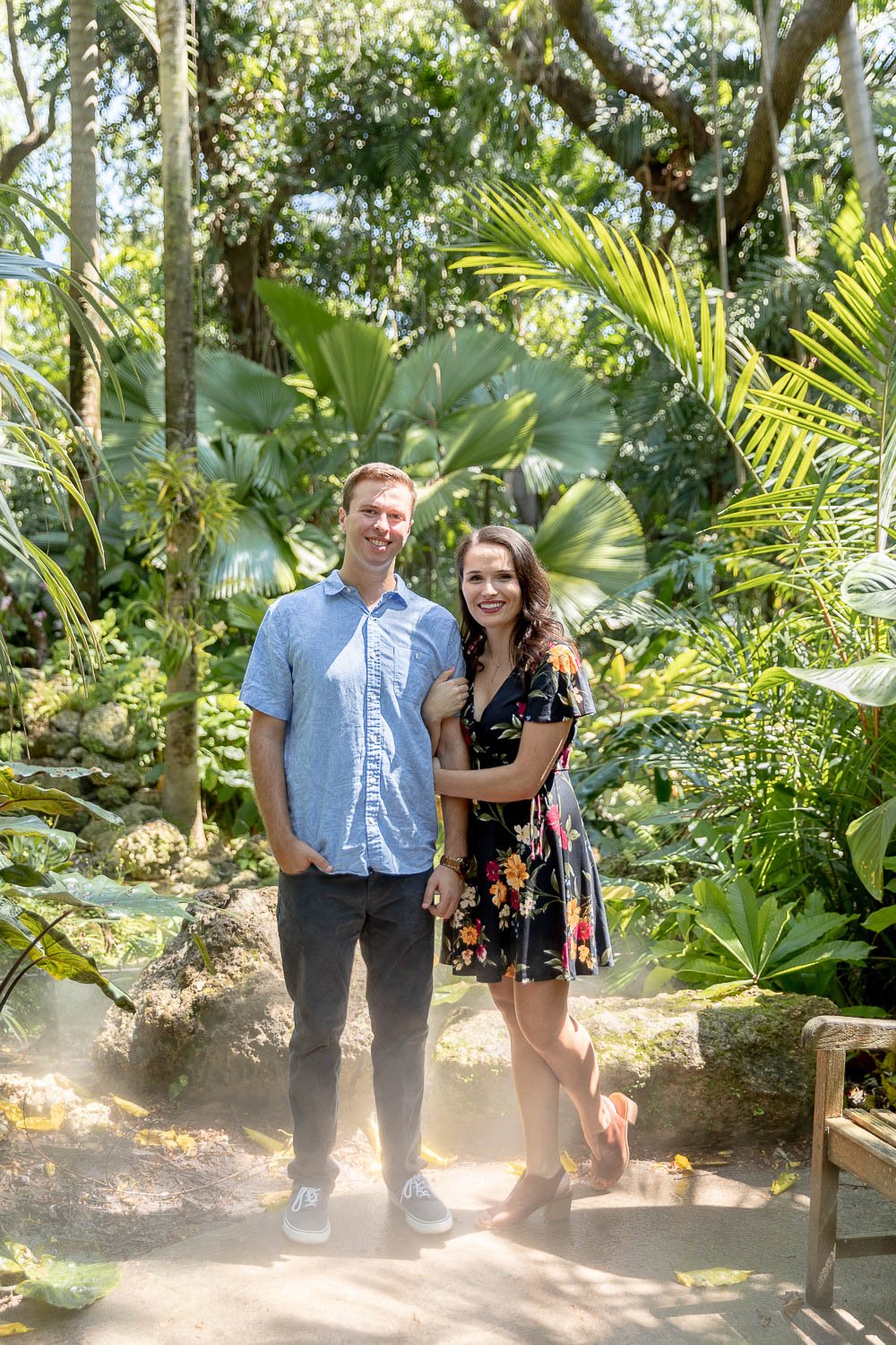 couple standing in the rainforest at Fairchild Botanical Gardens