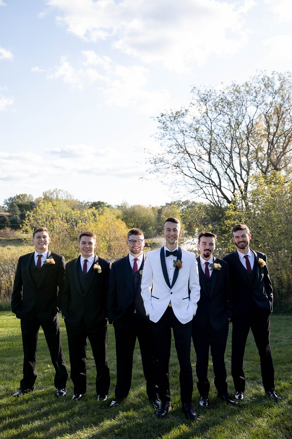 black and white groomsmen suits at wales wedding venue
