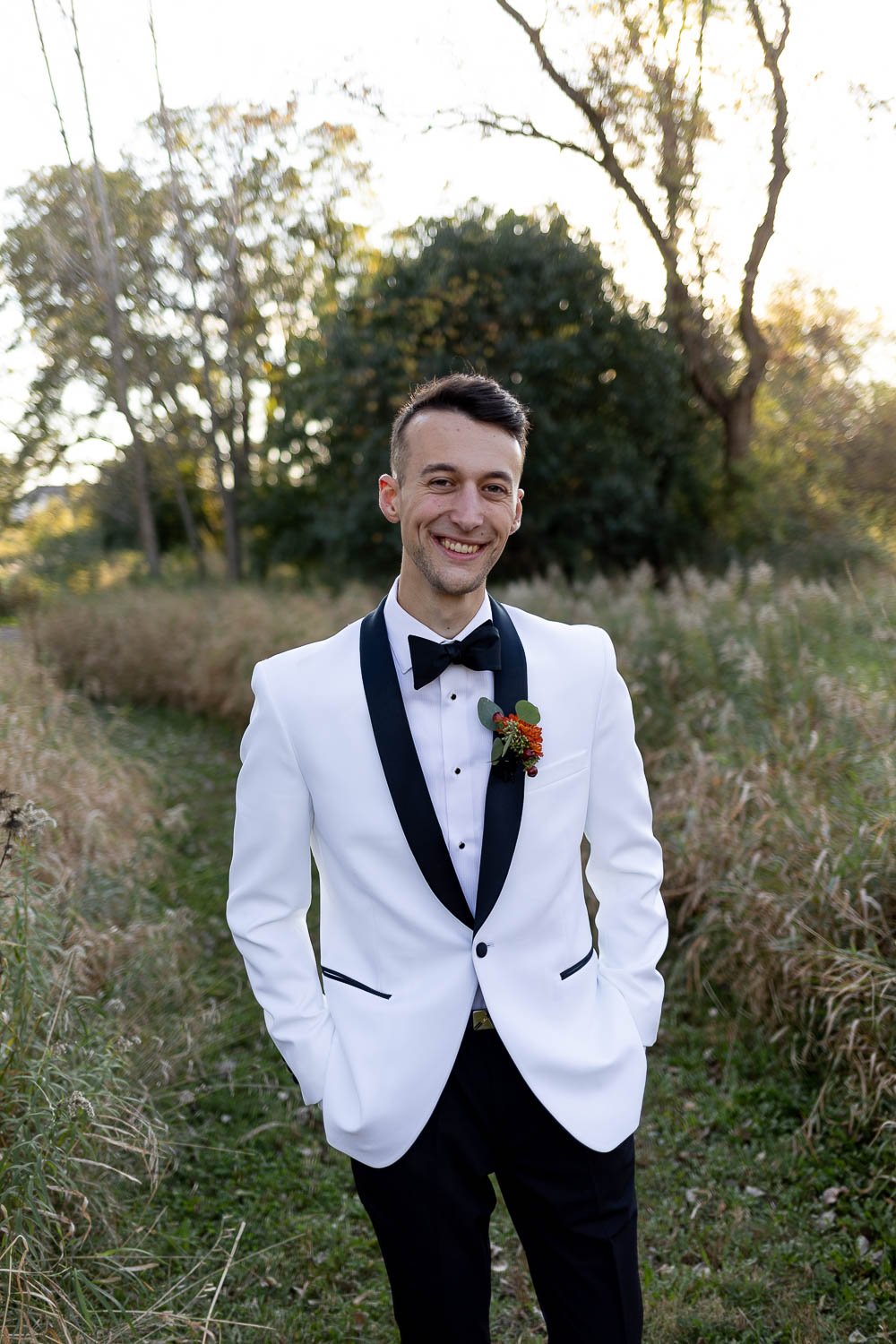 groom portrait at fete of wales fall wedding