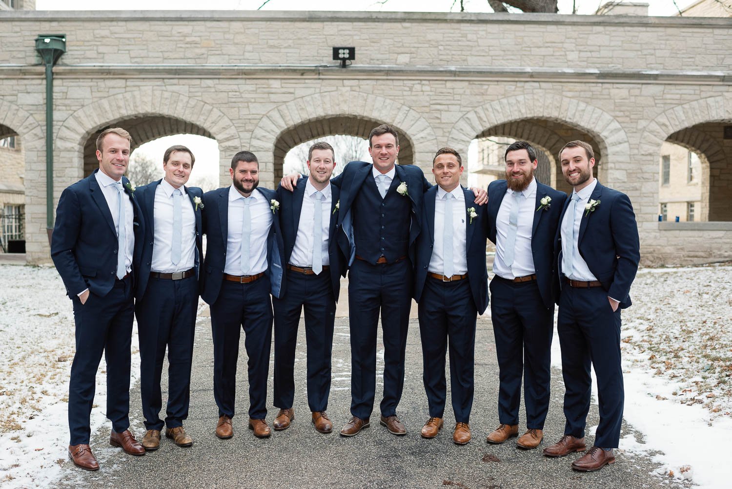 winter groomsmen party portrait at mount mary