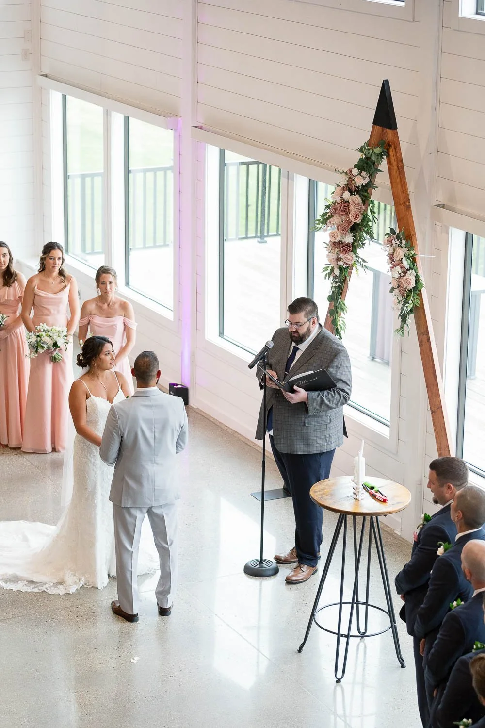 bride and groom at altar during ceremony
