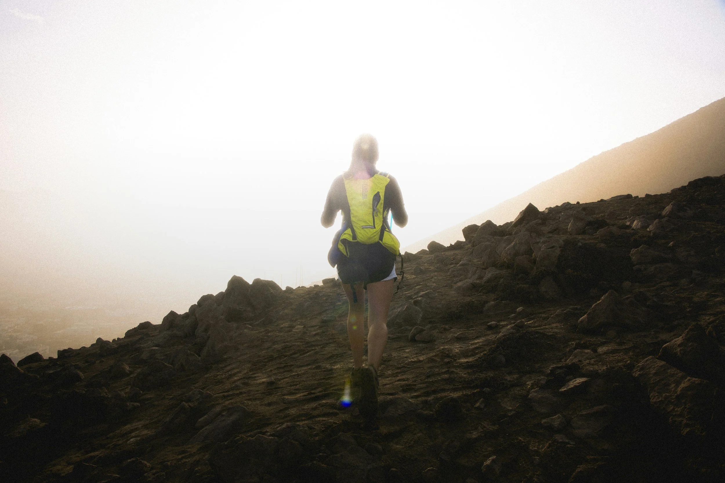 Competing in an ultra marathon.