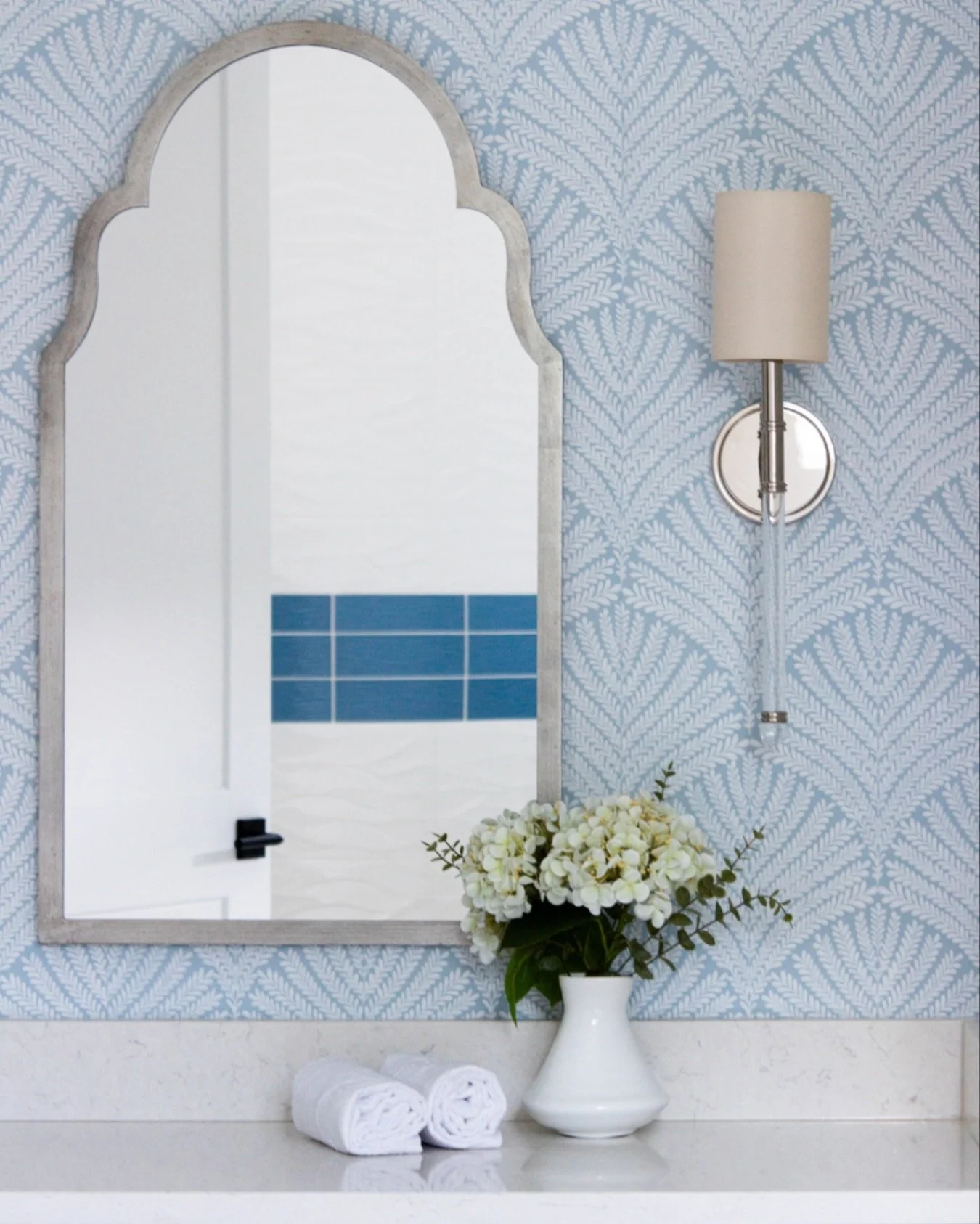 A beautiful make up vanity from a recent project. This wallpaper from @york_wallcoverings was one of my favorites in this Badin Lake, NC home. 

#makeupvanity #wallpaperdecor #lakesideretreat #ncinteriordesign #interiordesign #bathroomdesign