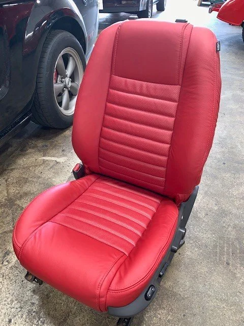 Red car seat custom upholstery