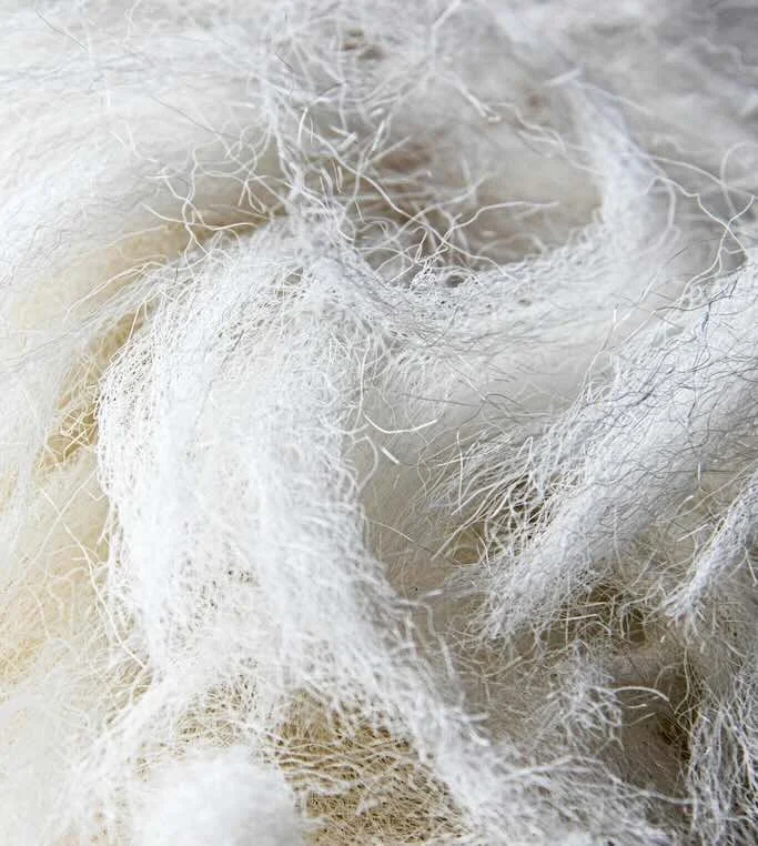 White Microfibres from fabric up close