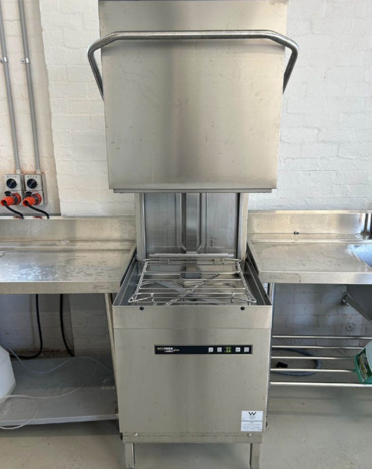 Hood dishwasher used for washing reusable cups and dish at events.