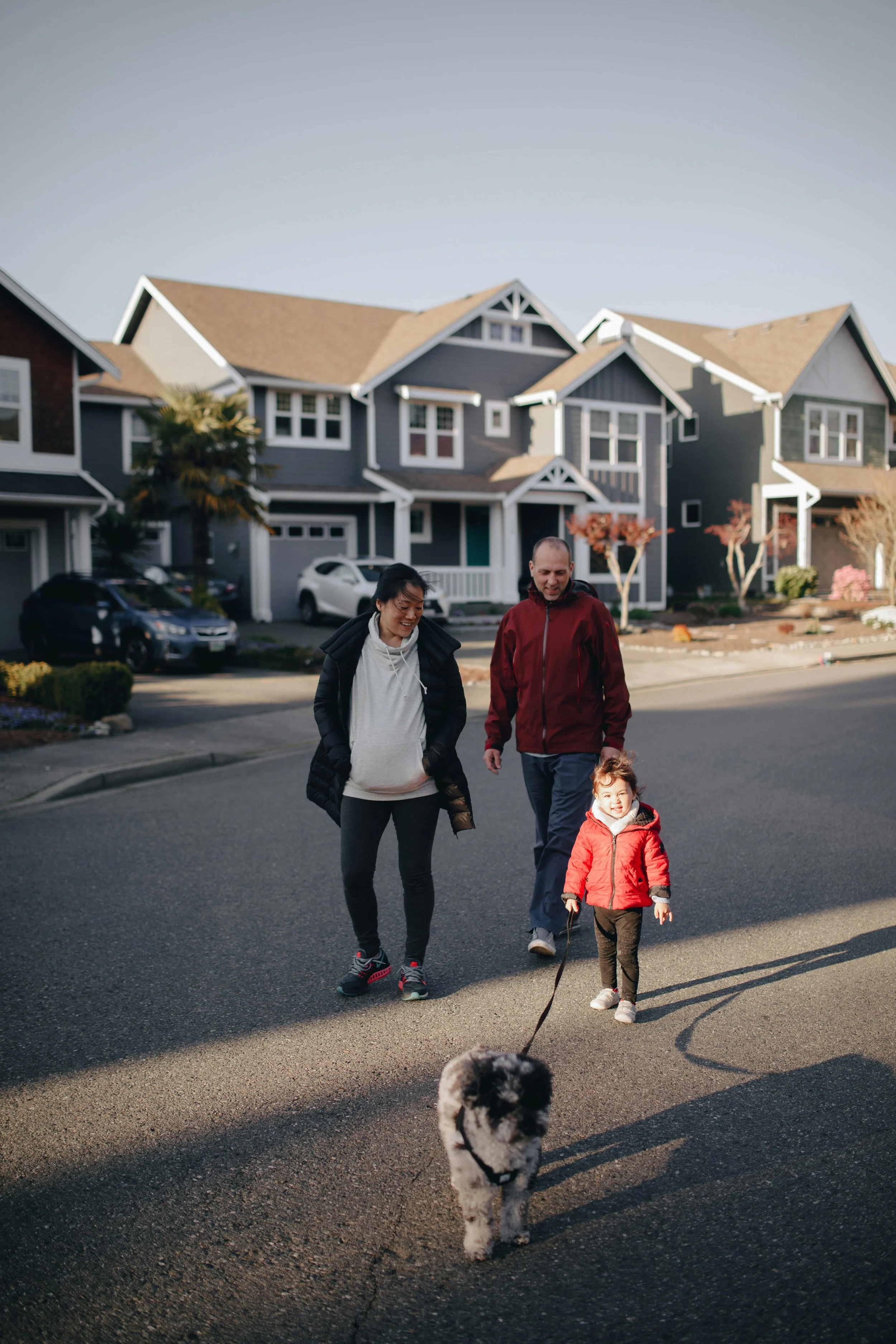 sacramento-suburban-new-mom-walking-with-toddler-and-husband-and-dog