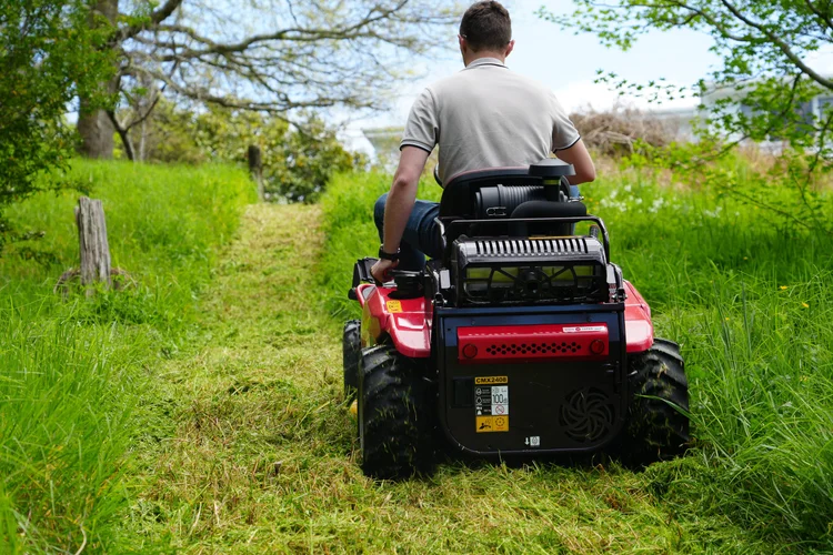 Razorback CMX2408 mowing through overgrown grass
