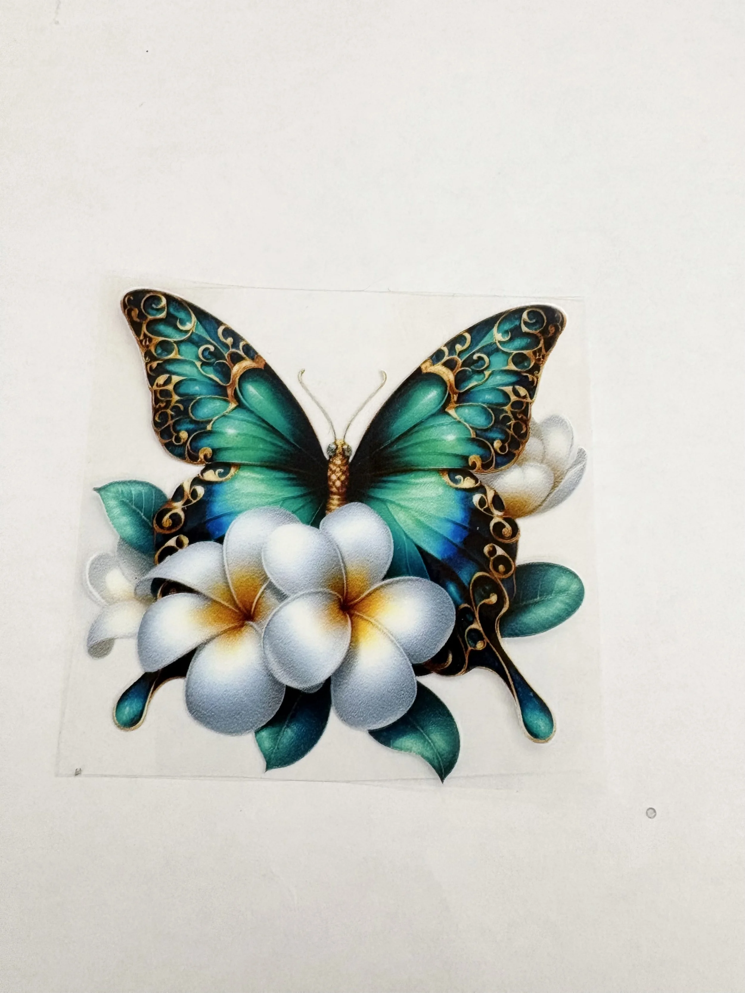 3.5” x 3.5” Teal Butterfly & Plumeria – UV DTF Sticker