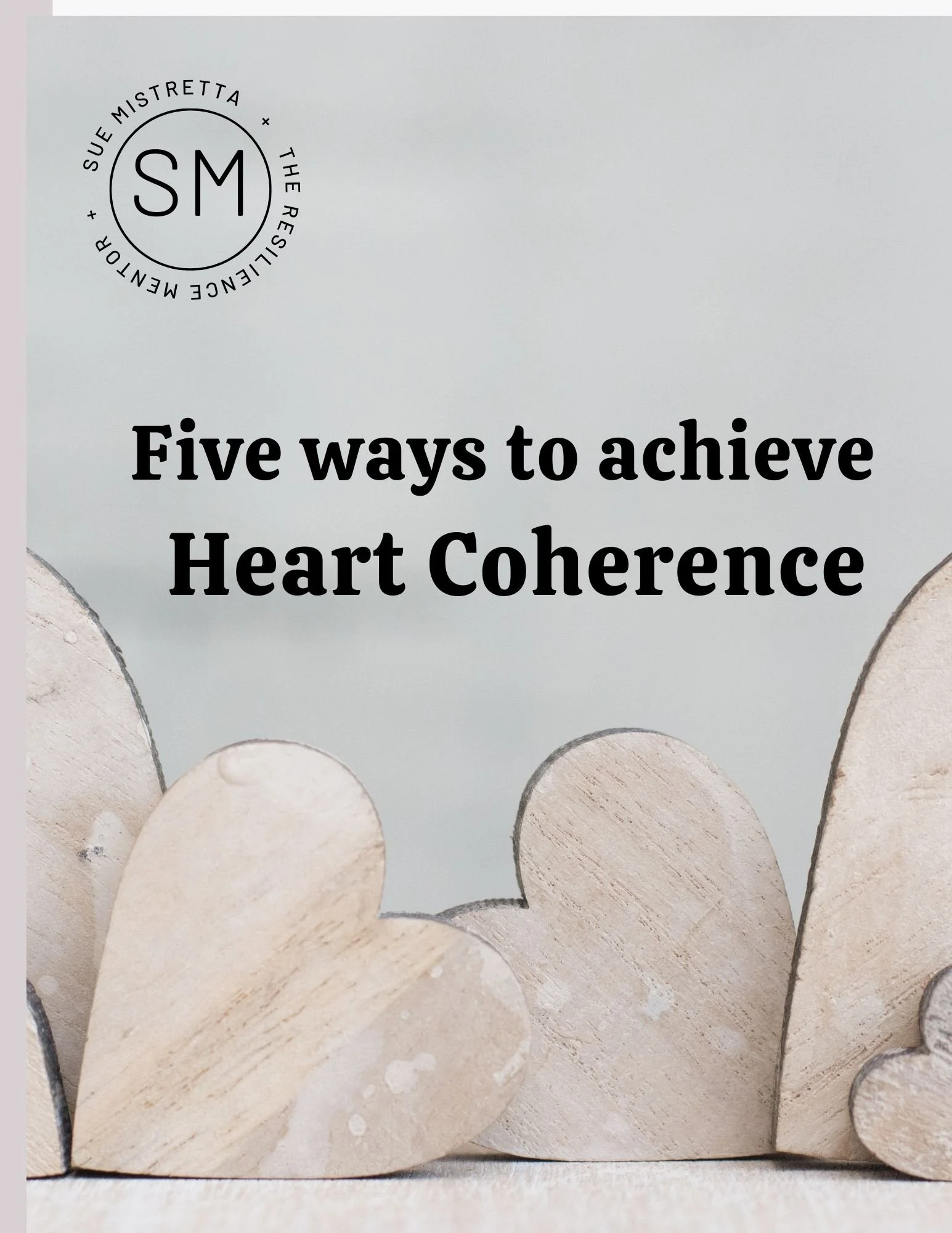 A light blue card with the text 'Five ways to achieve Heart Coherence' and a logo featuring the initials 'SM' surrounded by the words 'Sue Mistretta' and 'The Resilience Method' at the top left corner. The bottom part of the image shows several wooden dowels or sticks arranged vertically along the bottom edge.