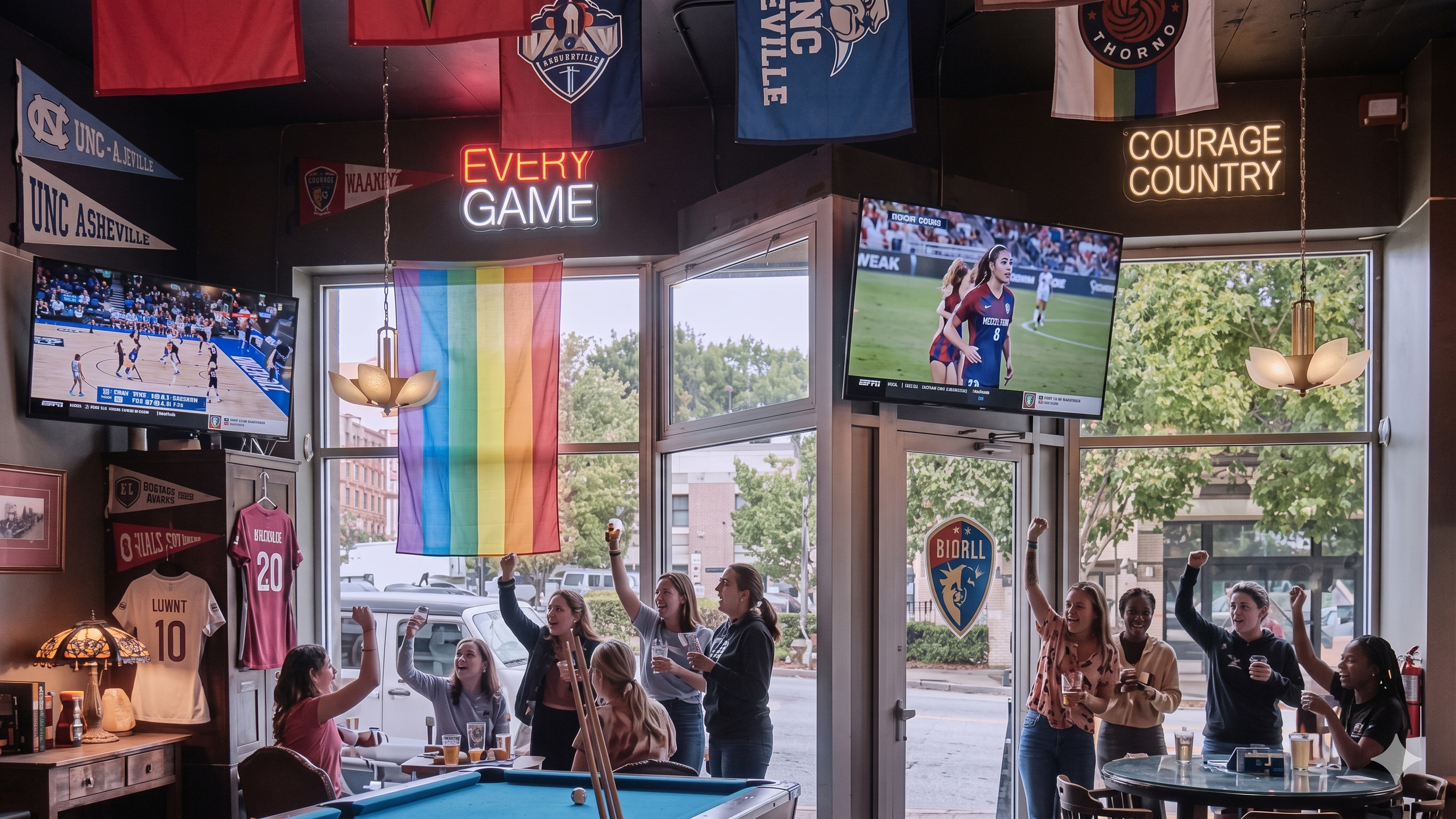 Guests cheering and celebrating inside Q-Hall, an LGBTQ+ women's sports bar in Asheville, NC, with rainbow flag, sports merchandise, and multiple TV screens showing women's sports