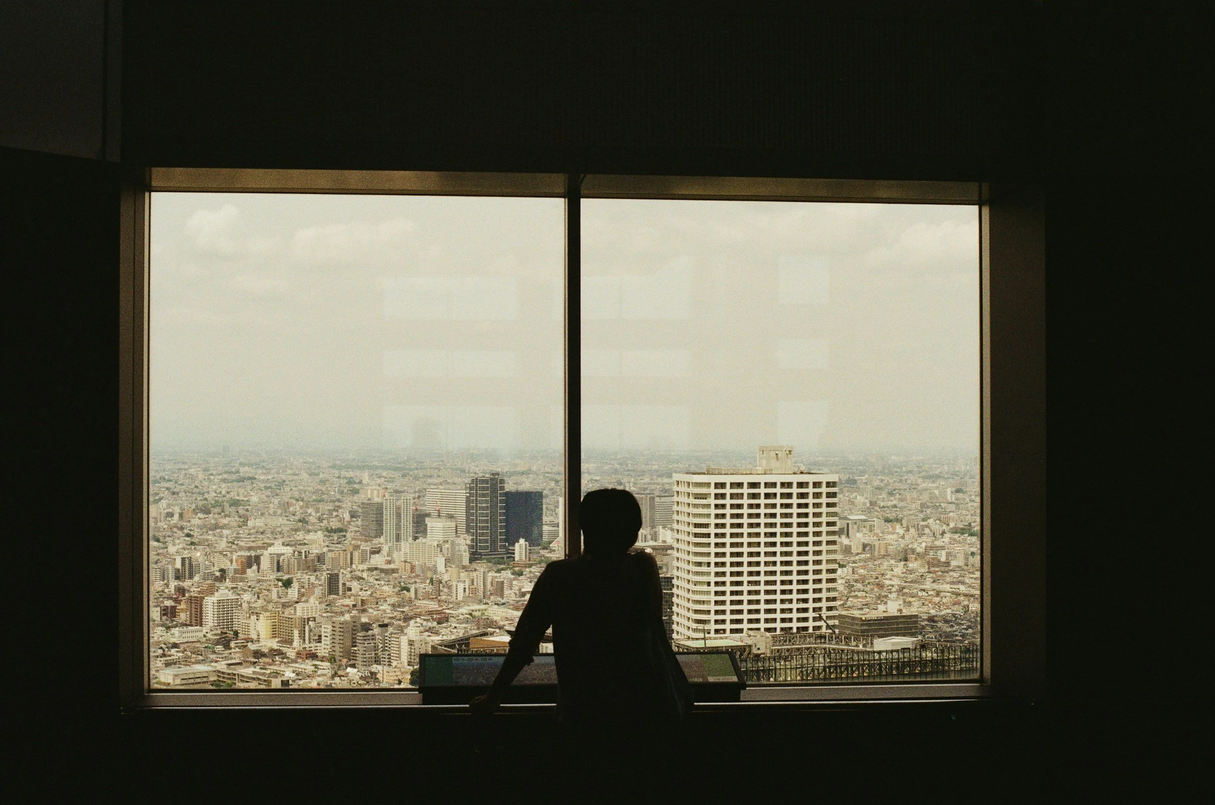 Executive looking out over the city