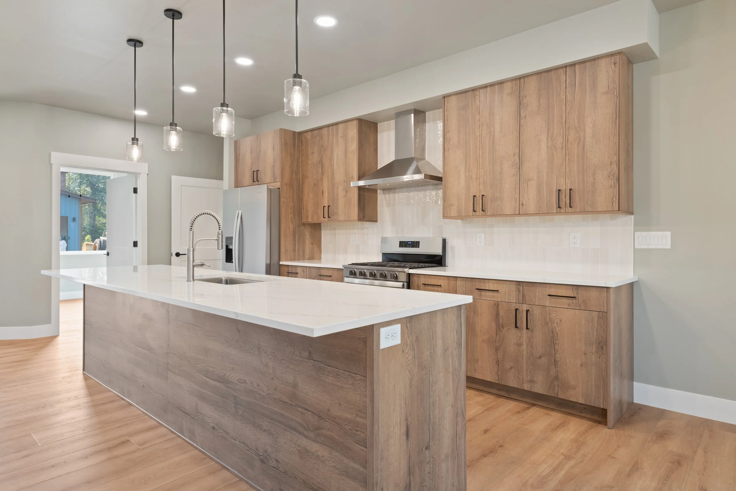 11 EXTRA - kitchen from the dining area (INT_P-9).jpg
