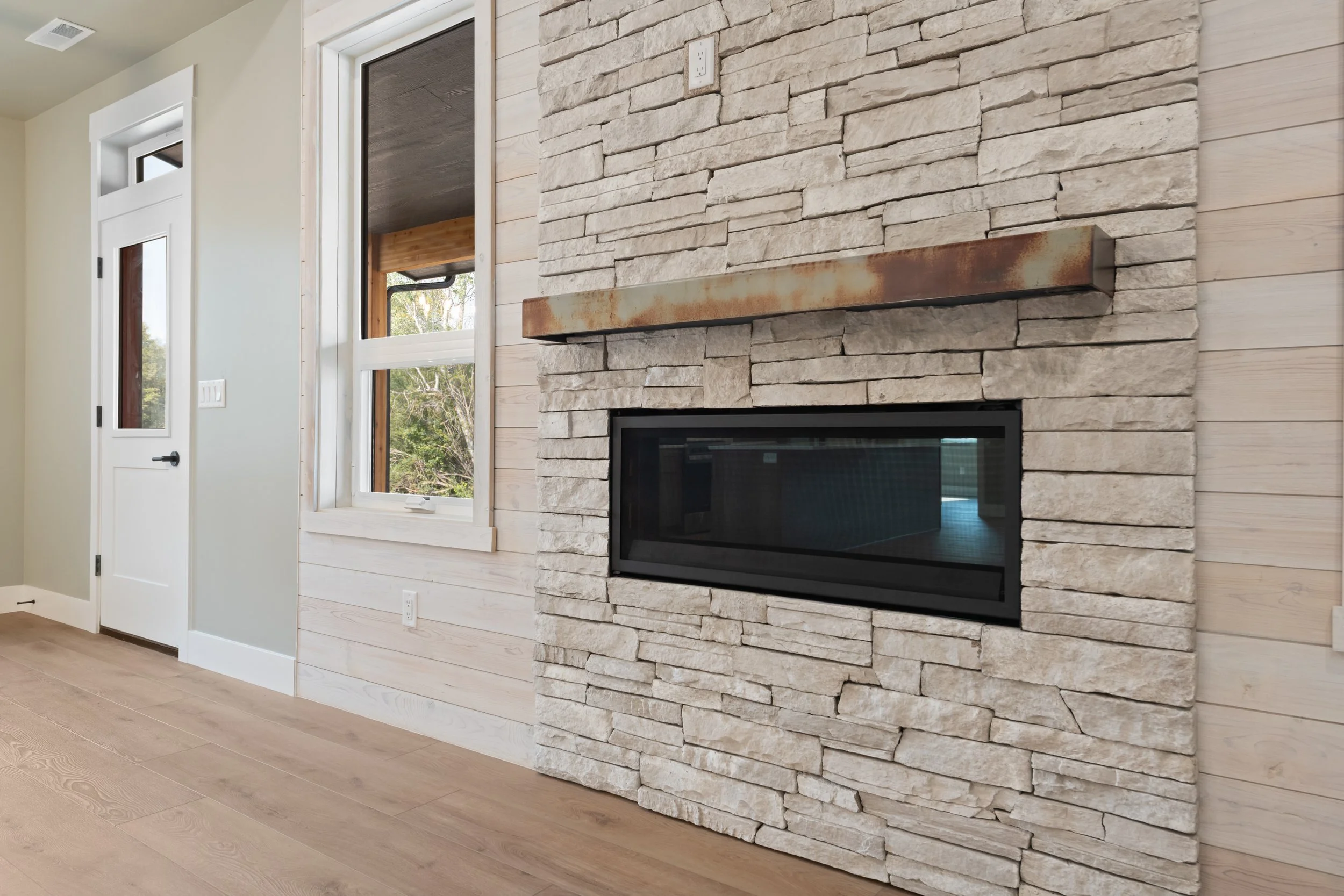 5 GRID - stone fireplace (INT_P-7).jpg