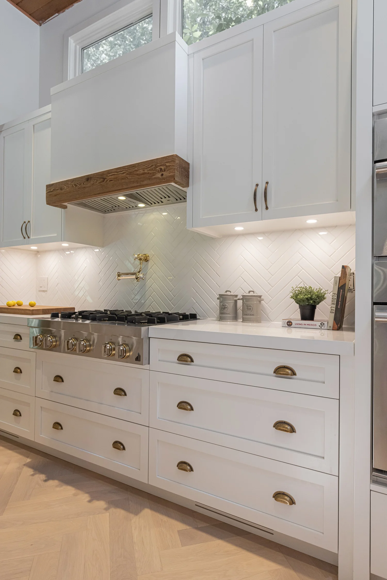 Custom shaker cabinetry and countertop detail by Metrico