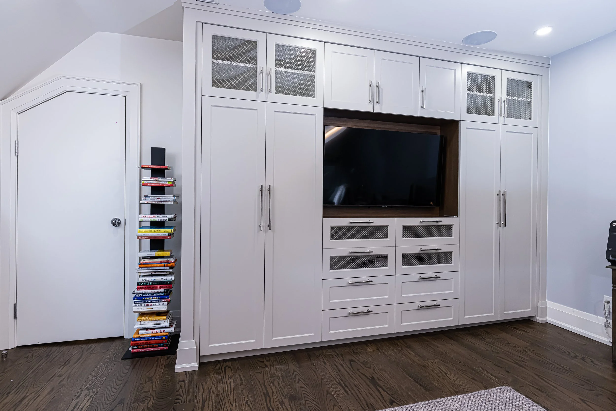 Traditional painted built-in wall unit with integrated millwork