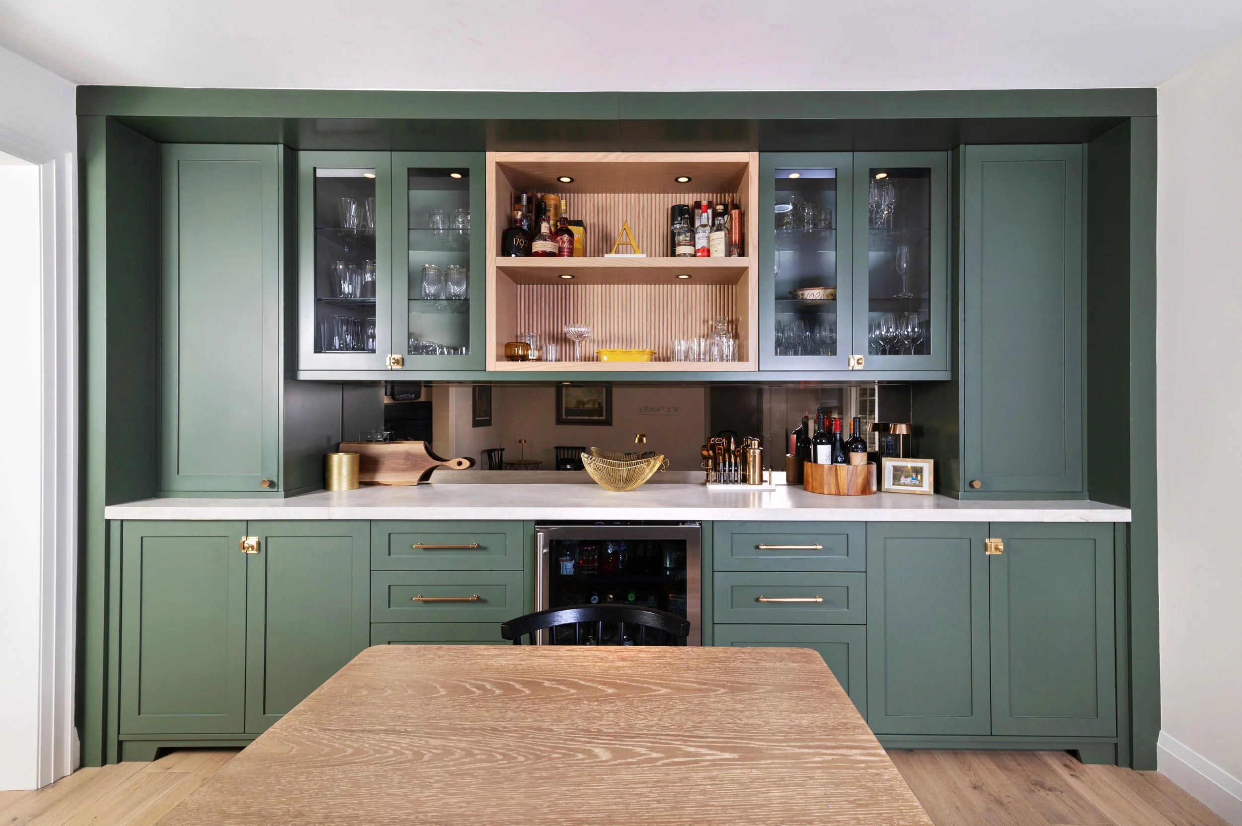 Transitional custom kitchen with fluted island