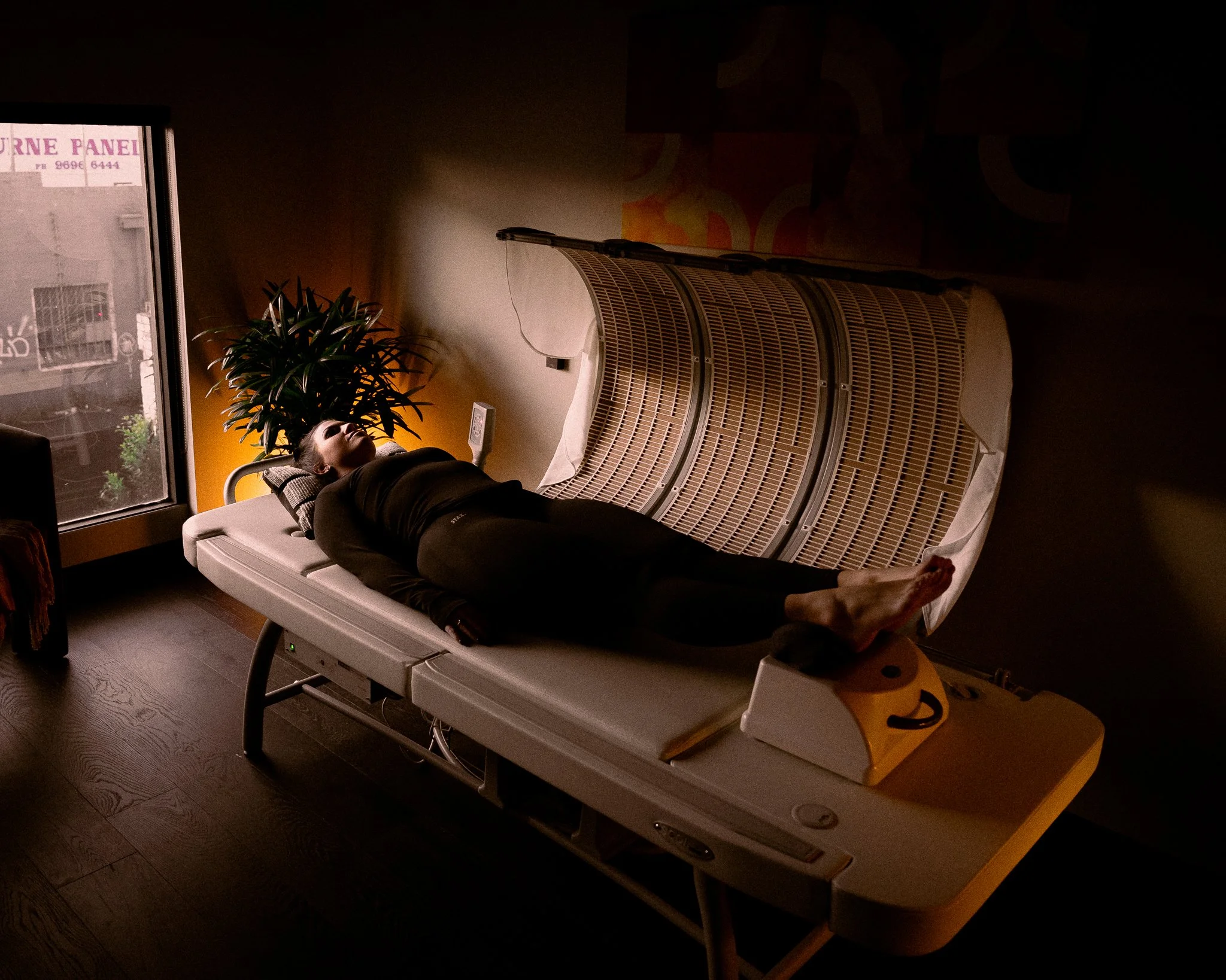 Woman laying on SOQI Bed