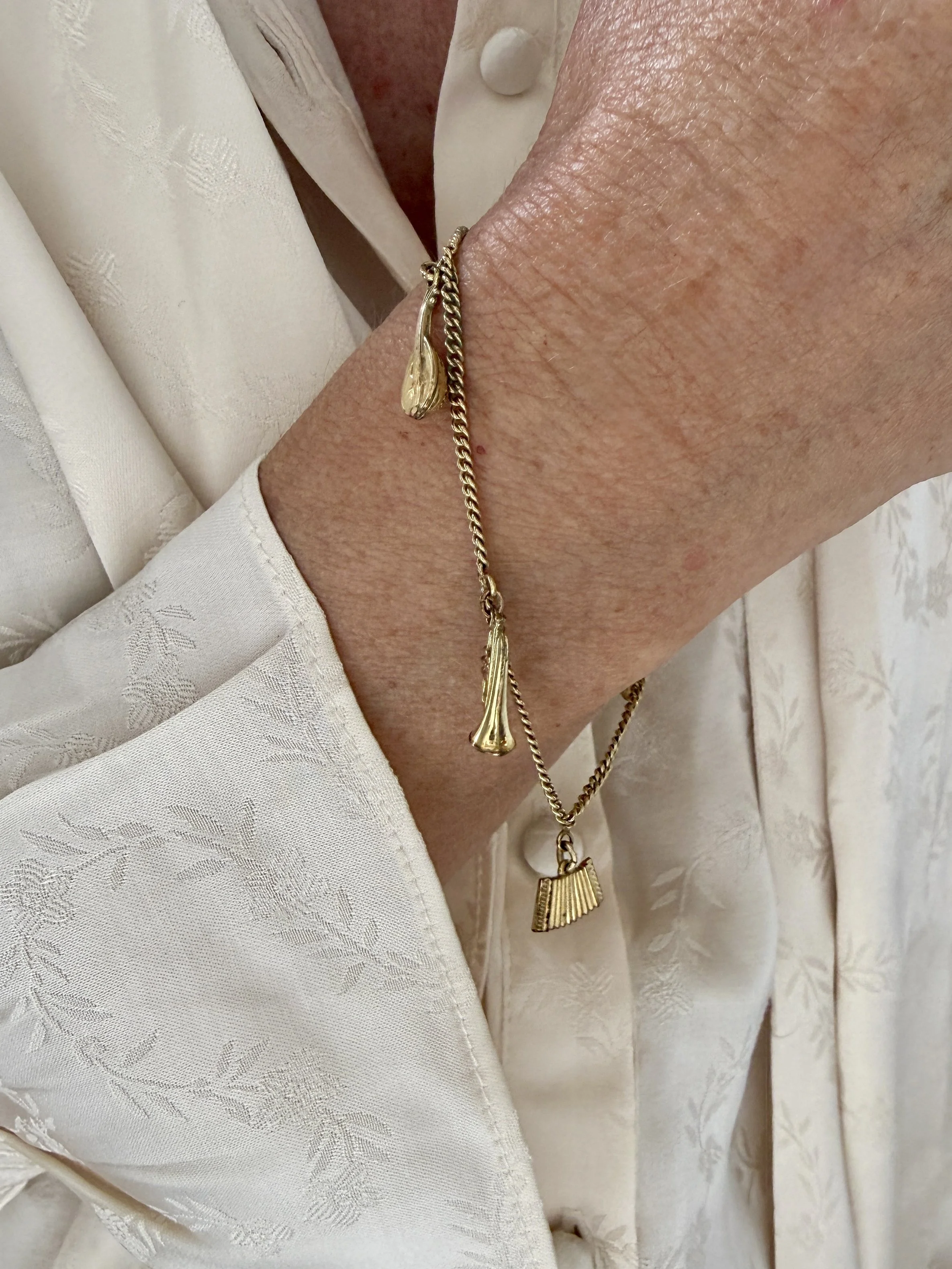 BVL1165-music-instruments-bracelet-worn.jpg