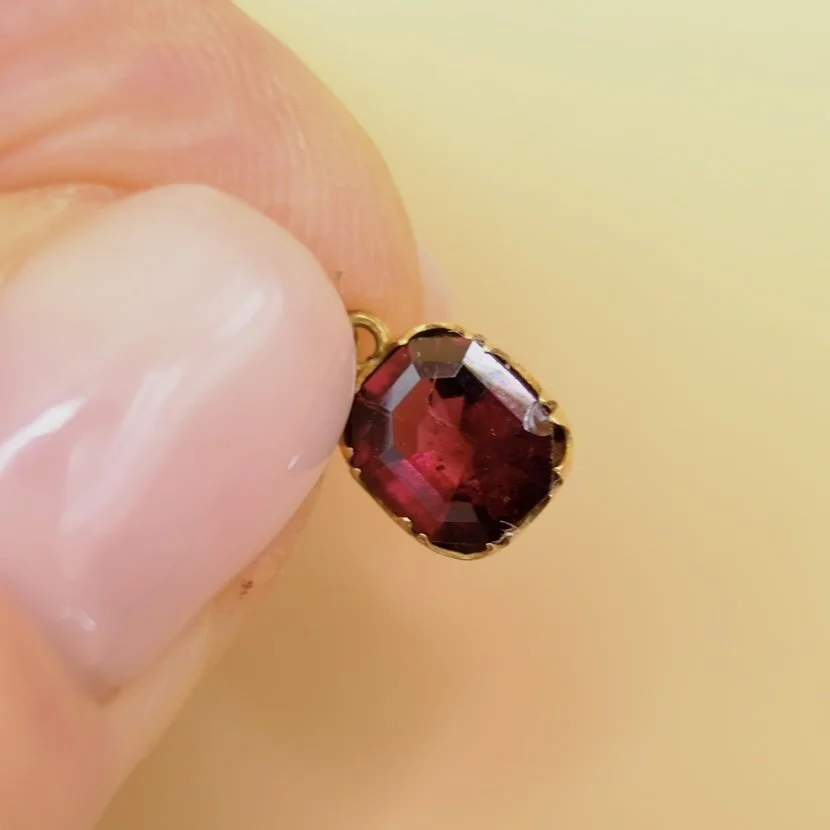 BVL1050-garnet-pendant-held.jpg