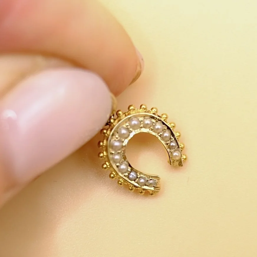 BVL1039-pearl-horseshoe-held.jpg