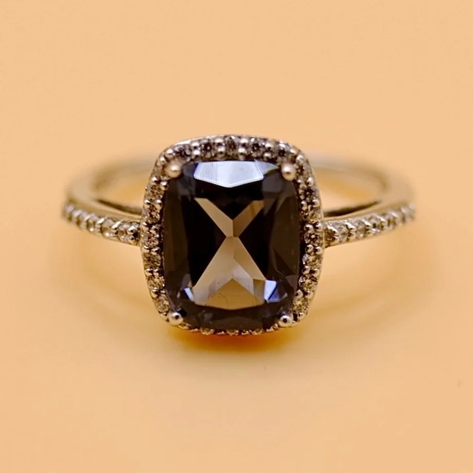 A bright paste tanzanite ring set in silver.  No one will know she&rsquo;s not spenny.

Linked in *New* above xx