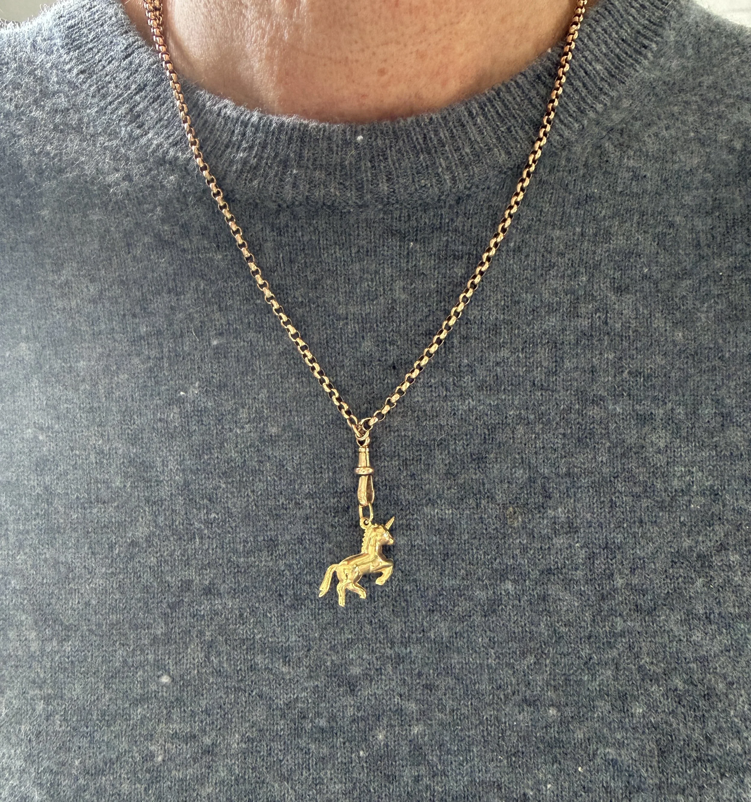 BVL1151-gold-unicorn-pendant-worn.jpg