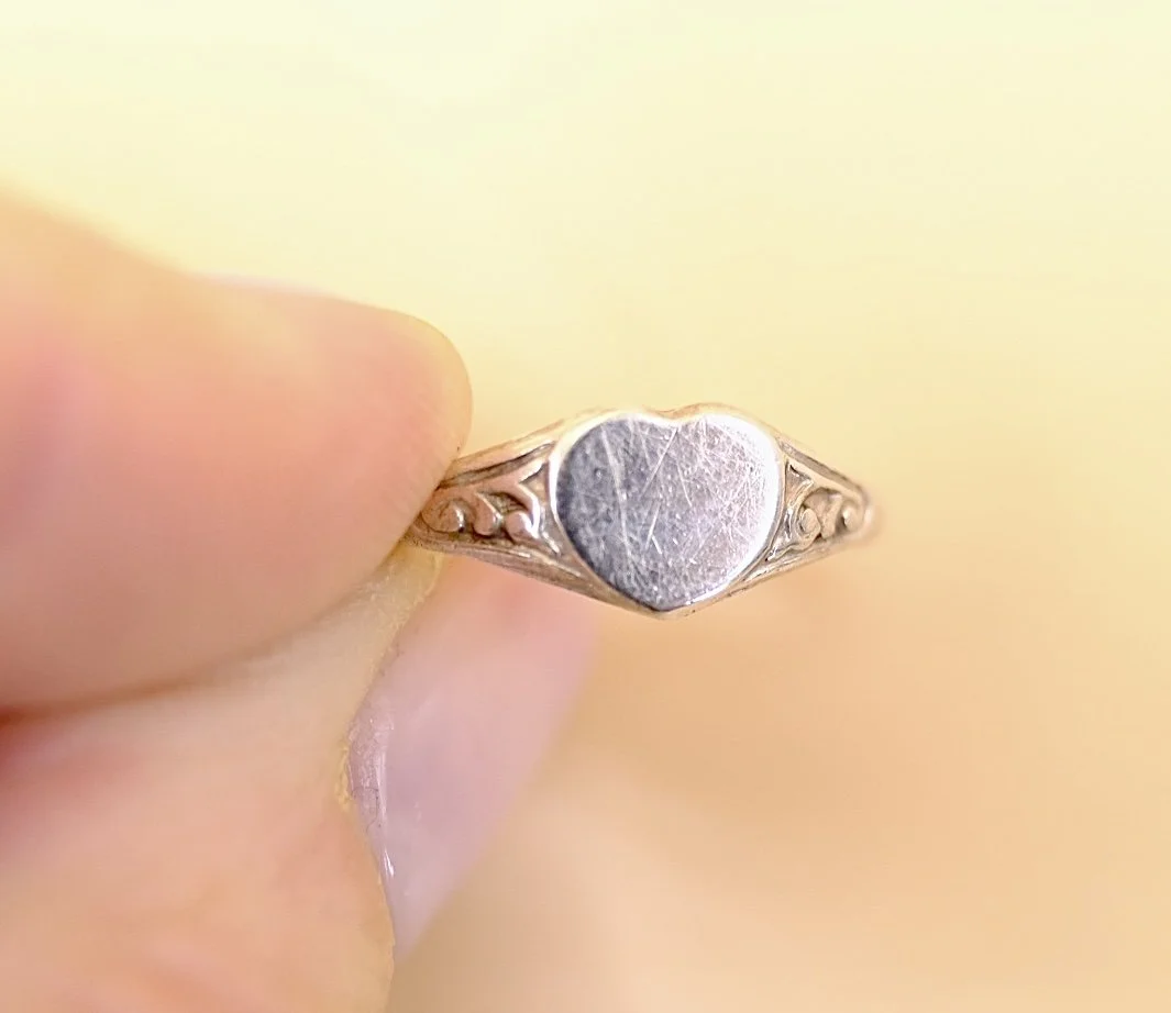 BVL1155-silver-heart-ring-held.jpg