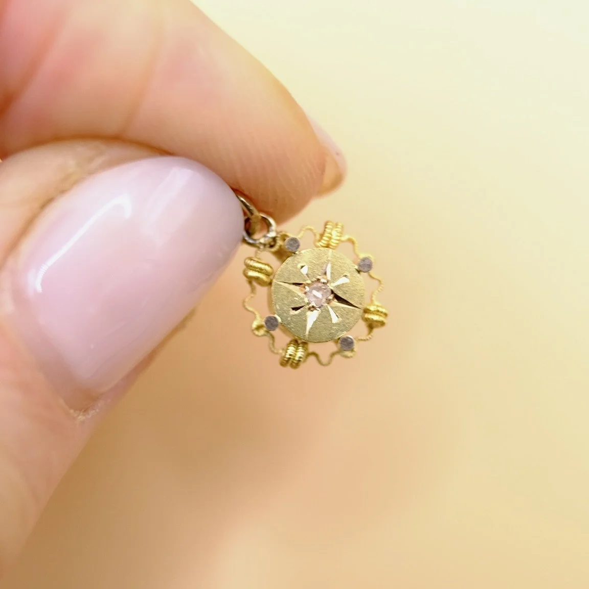 BVL1040-diamond-circle-charm-held.jpg
