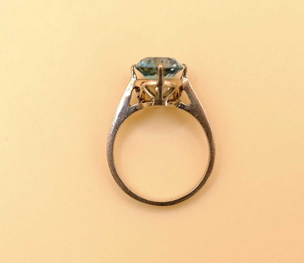 BVL1055-blue-zircon-solitaire-ring-side.jpg
